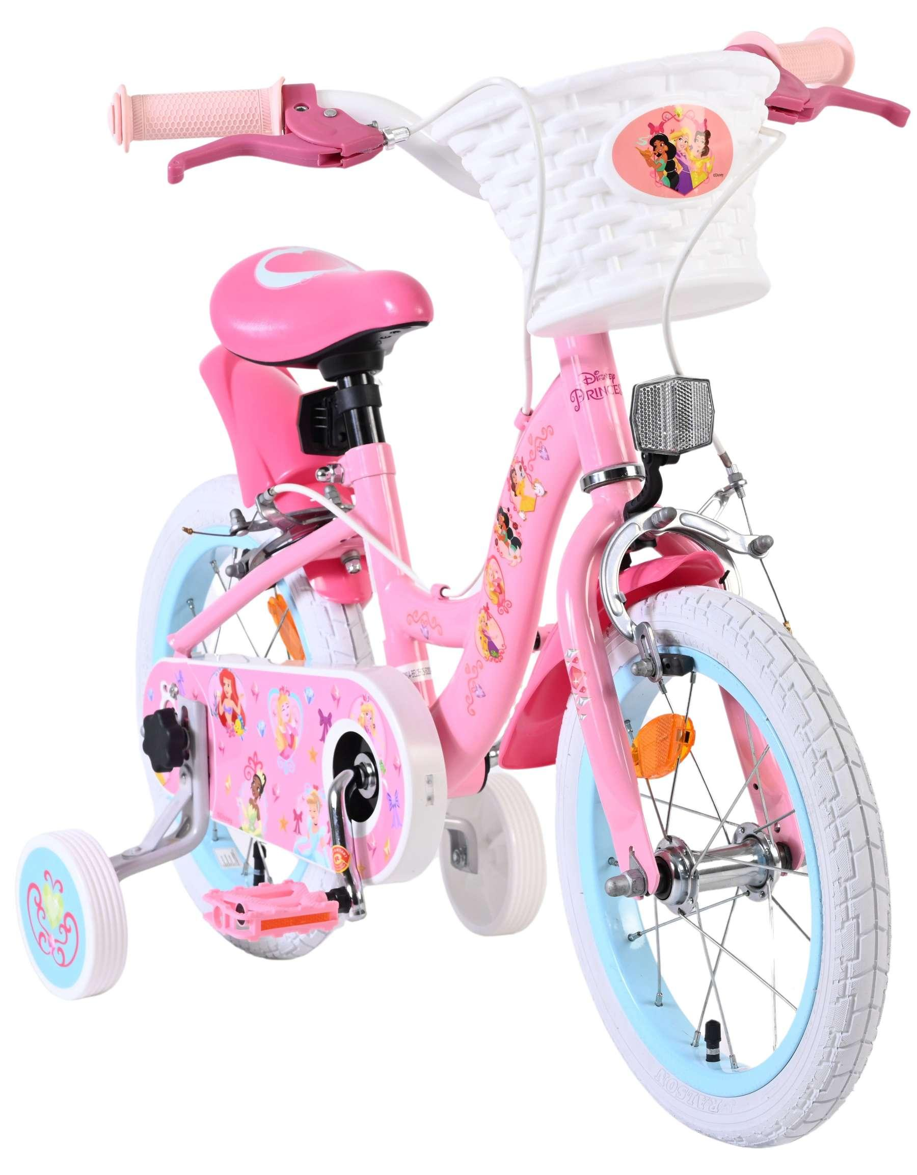 Ein rosafarbenes Disney Prinzessinnen-Fahrrad mit Stützrädern und weißem Korb.