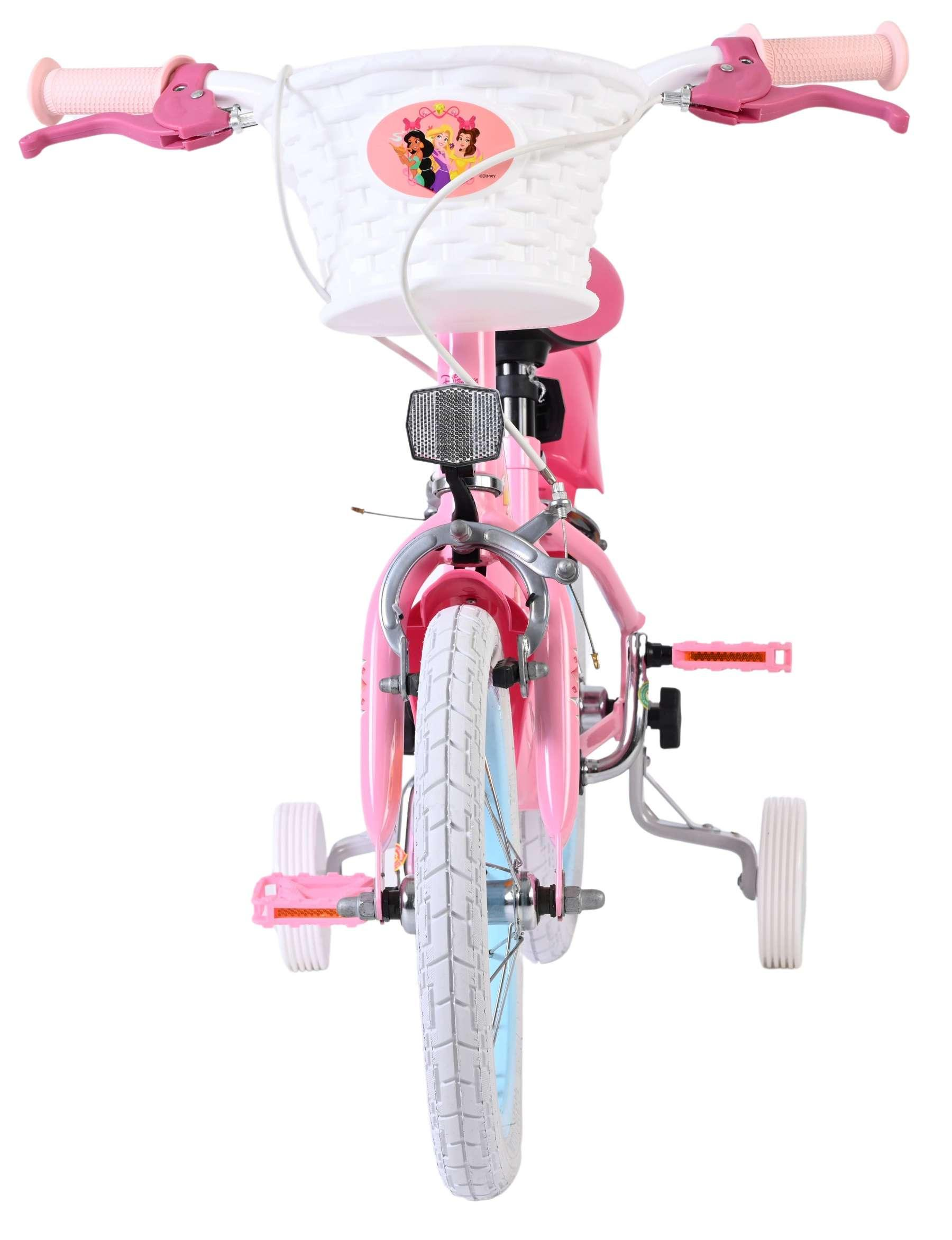 Ein rosa Kinderfahrrad mit Stützrädern, weißem Korb und Prinzessinnen-Aufklebern.