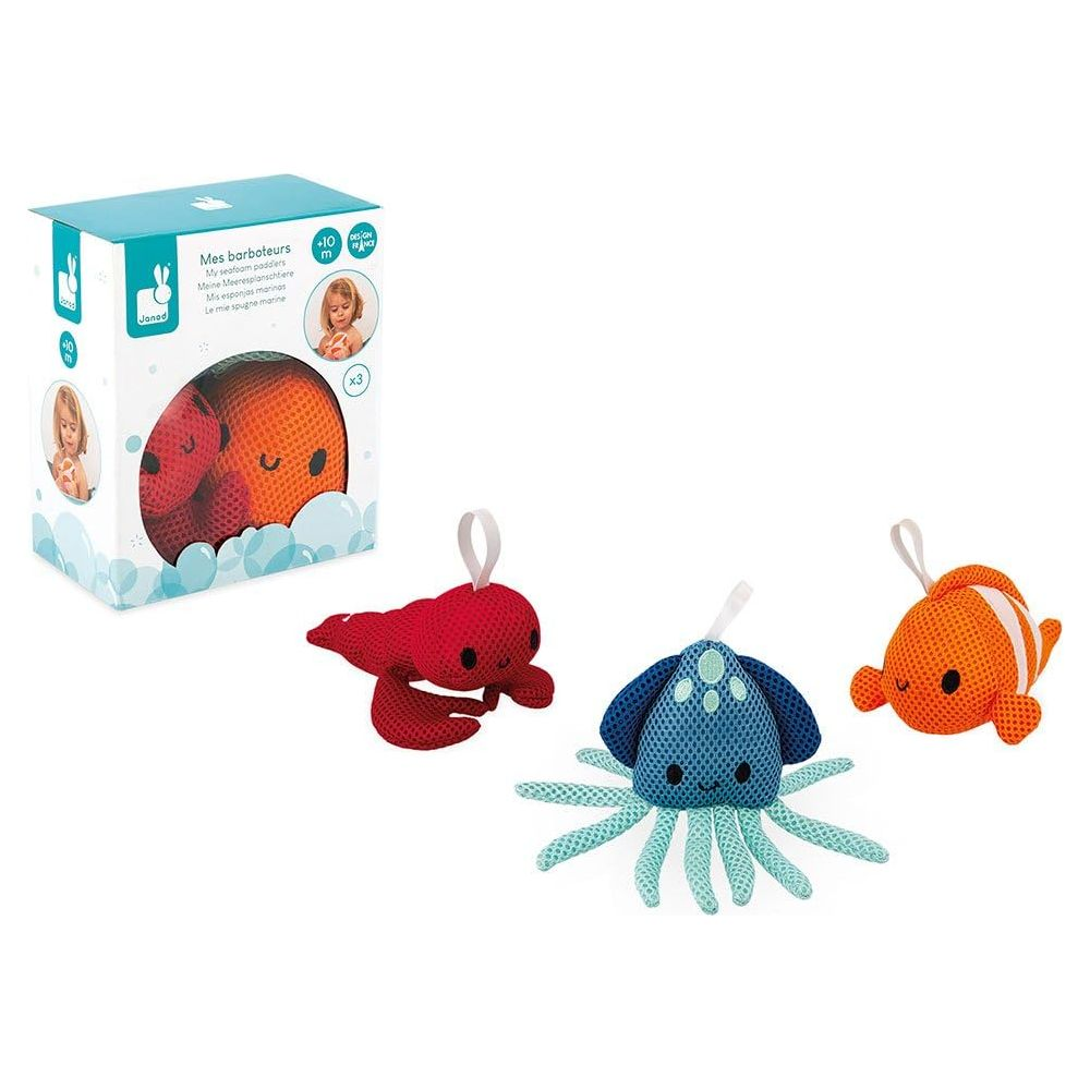 Ein roter Krebs, ein blauer Oktopus und ein orangefarner Fisch aus Stoff.