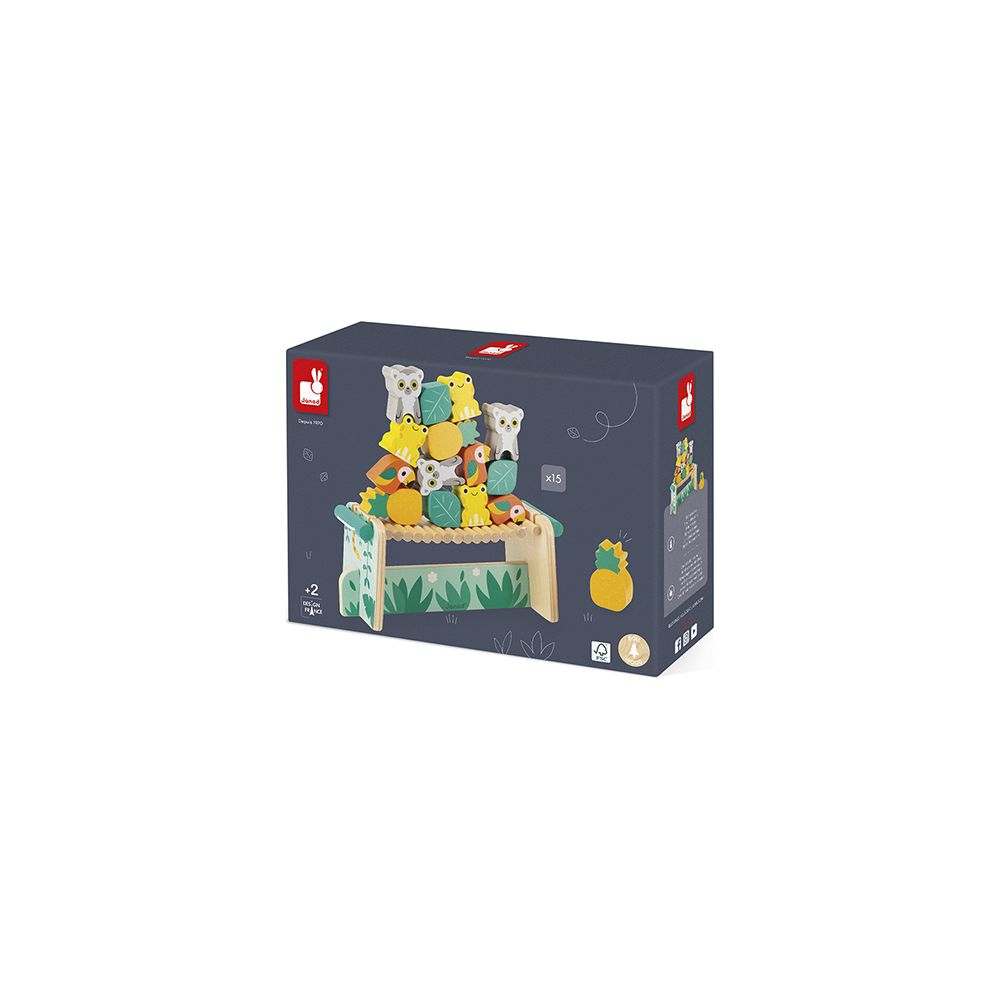 Boîte de jouets à empiler en bois avec des animaux et des fruits, sur un banc en bois à motifs végétaux.