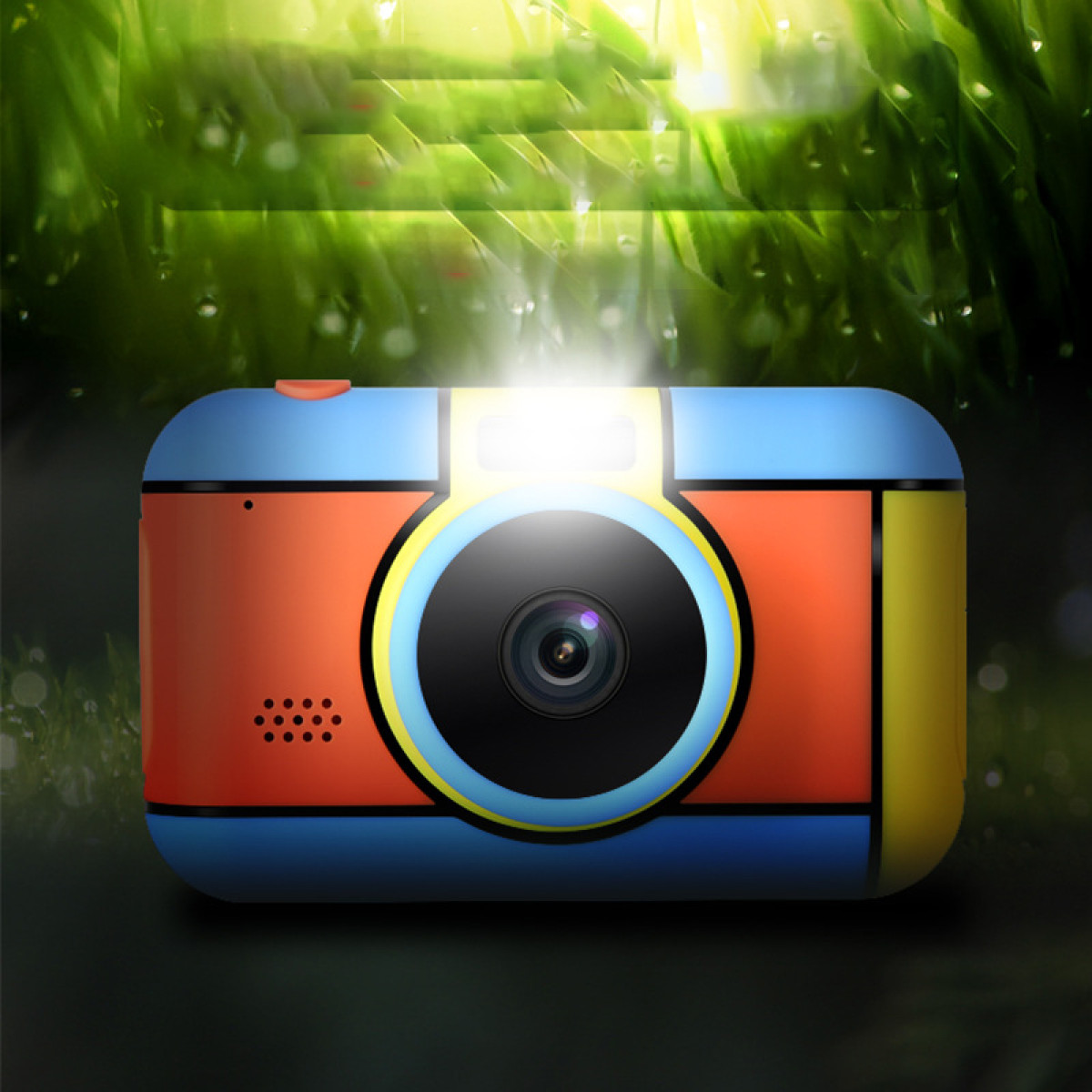 Eine bunte Digitalkamera mit blauen, orangen und gelben Akzenten. Blitz ist an.