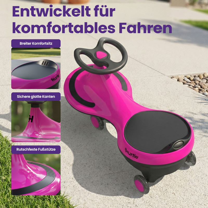 Ein pinker Wiggle-Wagen mit schwarzem Sitz und Lenkrad steht auf einem Gehweg.