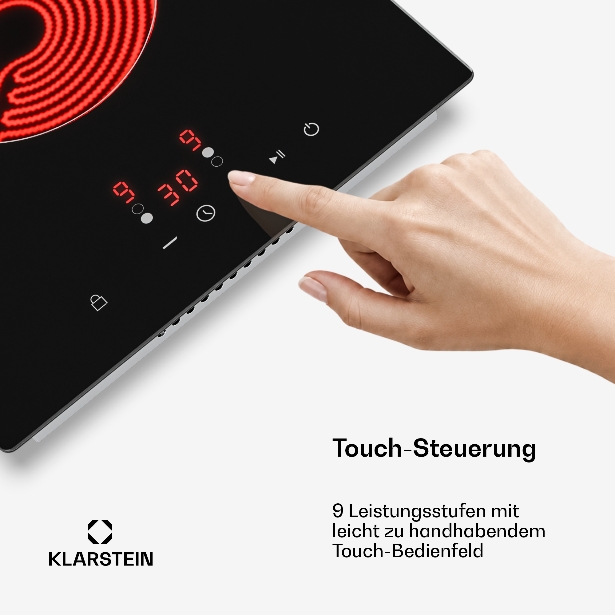 Eine Hand bedient ein Kochfeld mit Touch-Steuerung und rotem Heizelement.