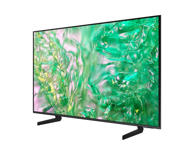 Una TV moderna a schermo piatto con un'immagine astratta verde, appoggiata sulla sua base.