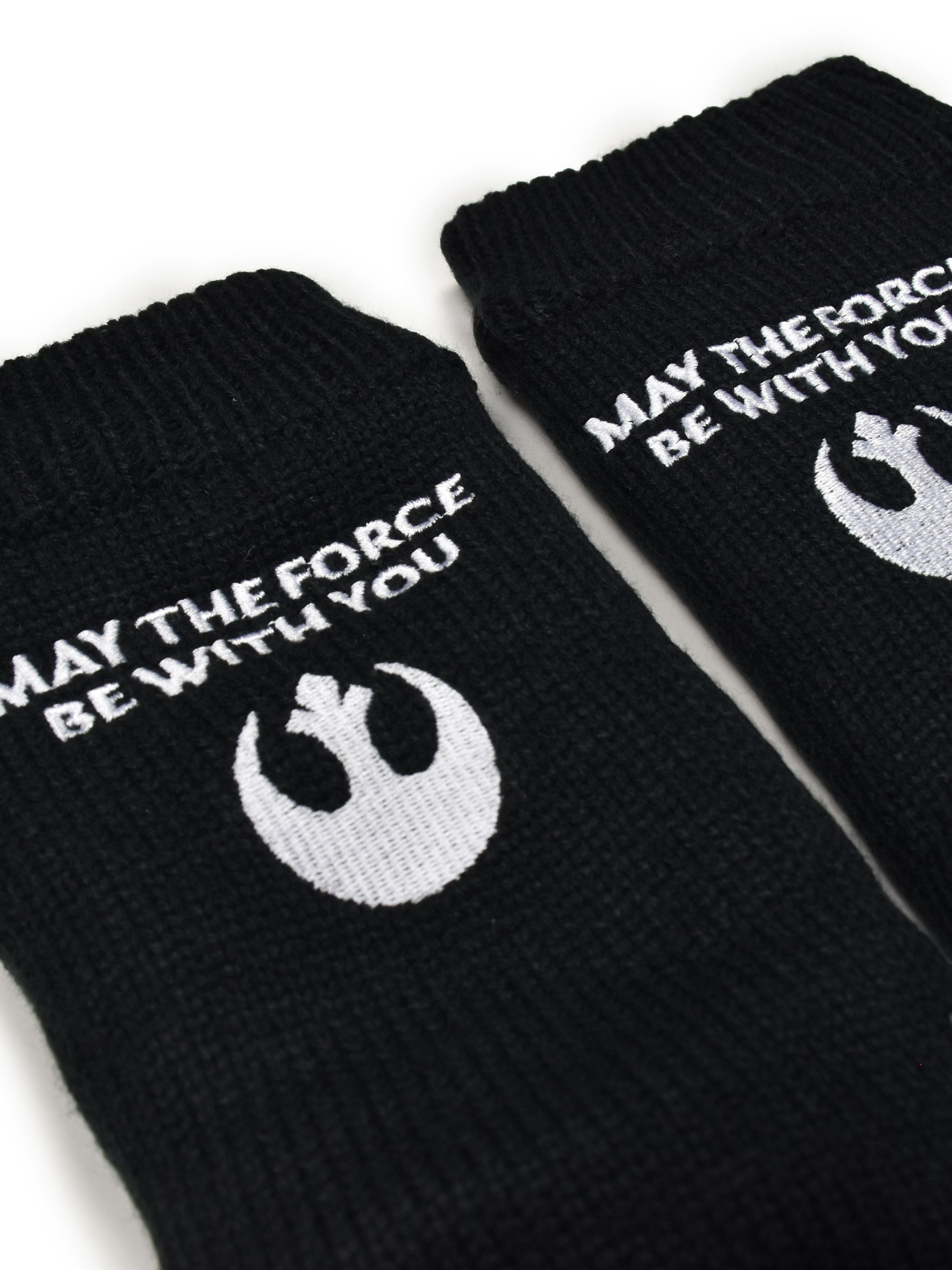 Schwarze Socken mit weißem Rebel-Logo und Text.