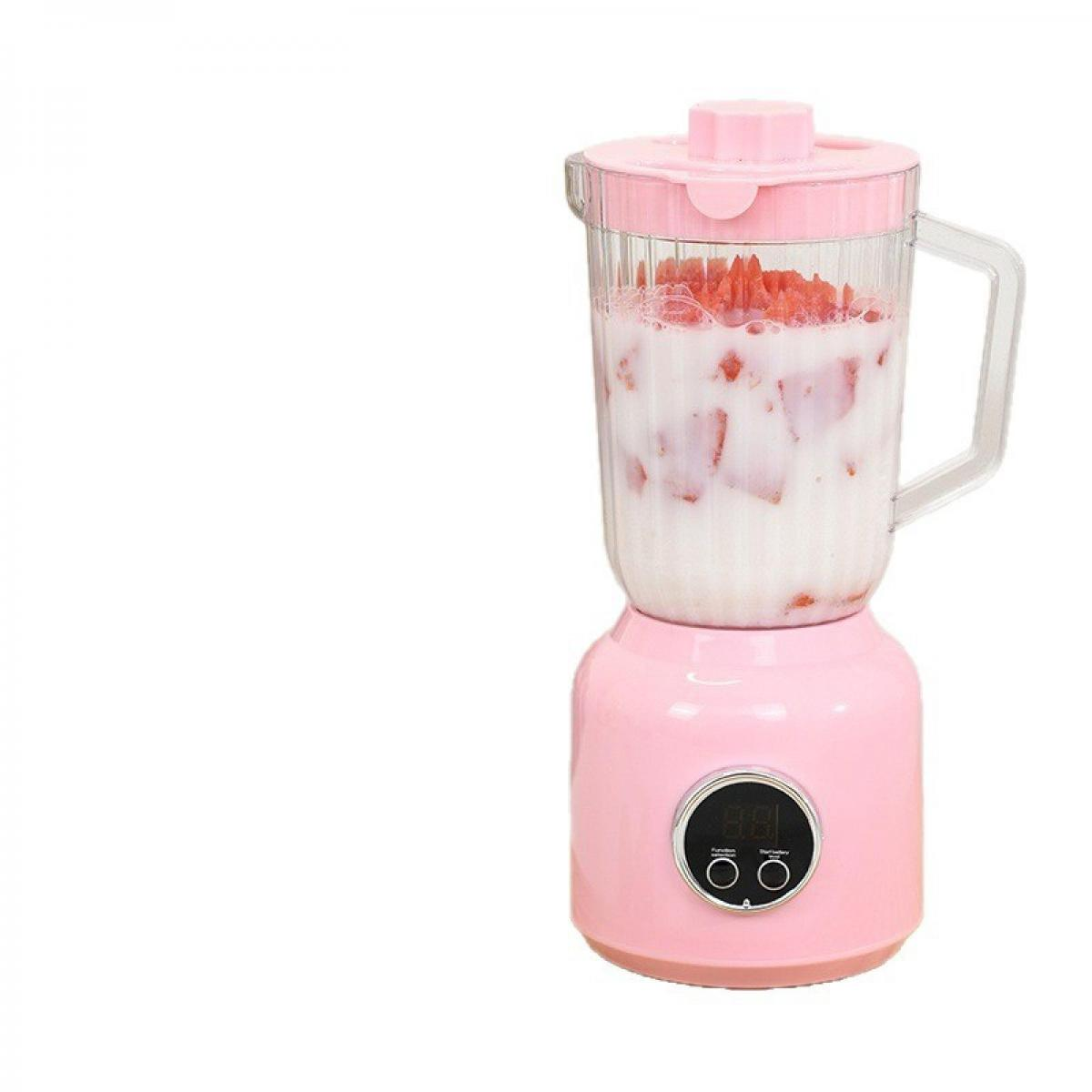 Ein rosa Mixer mit einem durchsichtigen Krug, gefüllt mit Milch und Erdbeere.