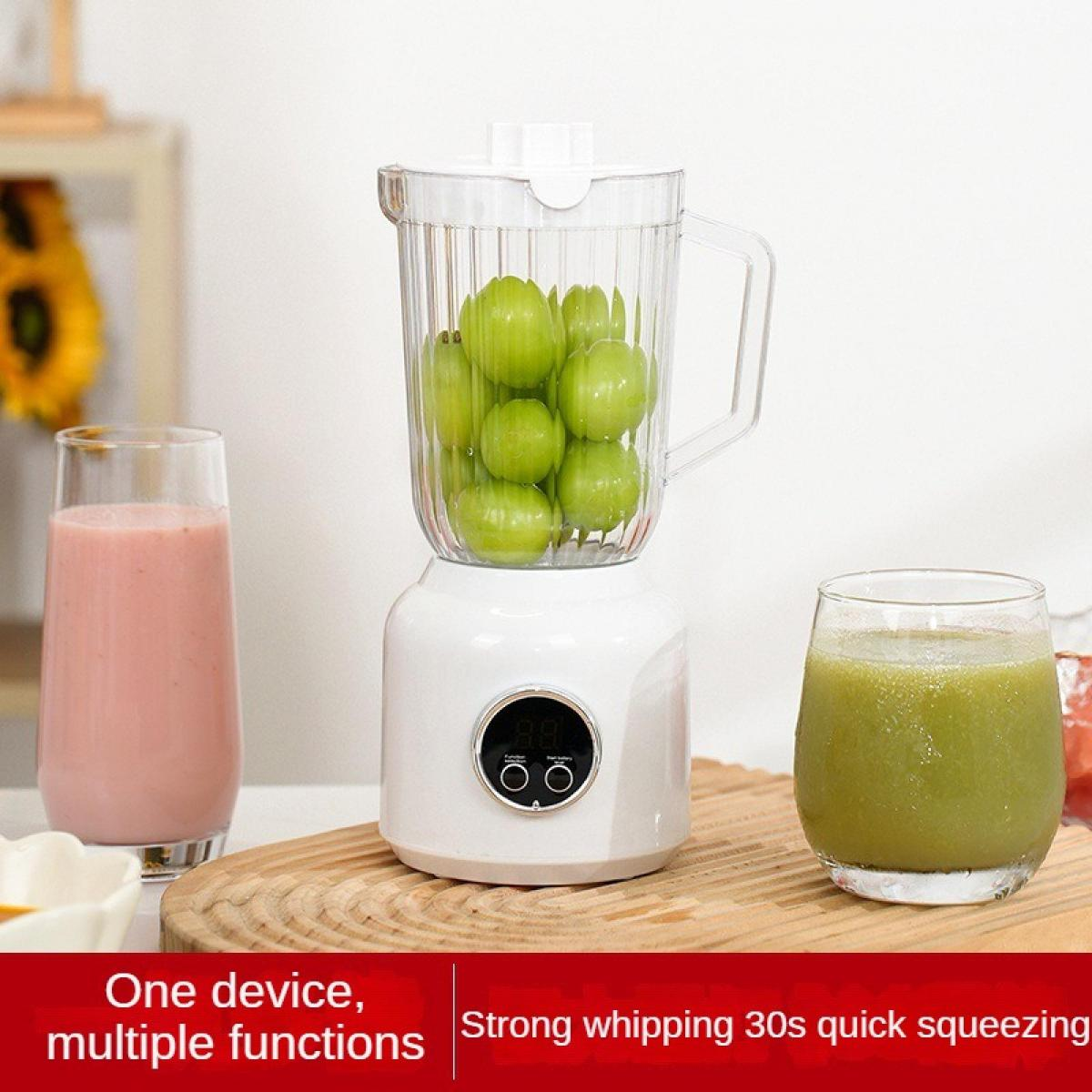 Ein weißer Mixer mit grünen Trauben steht zwischen zwei Gläsern Saft.