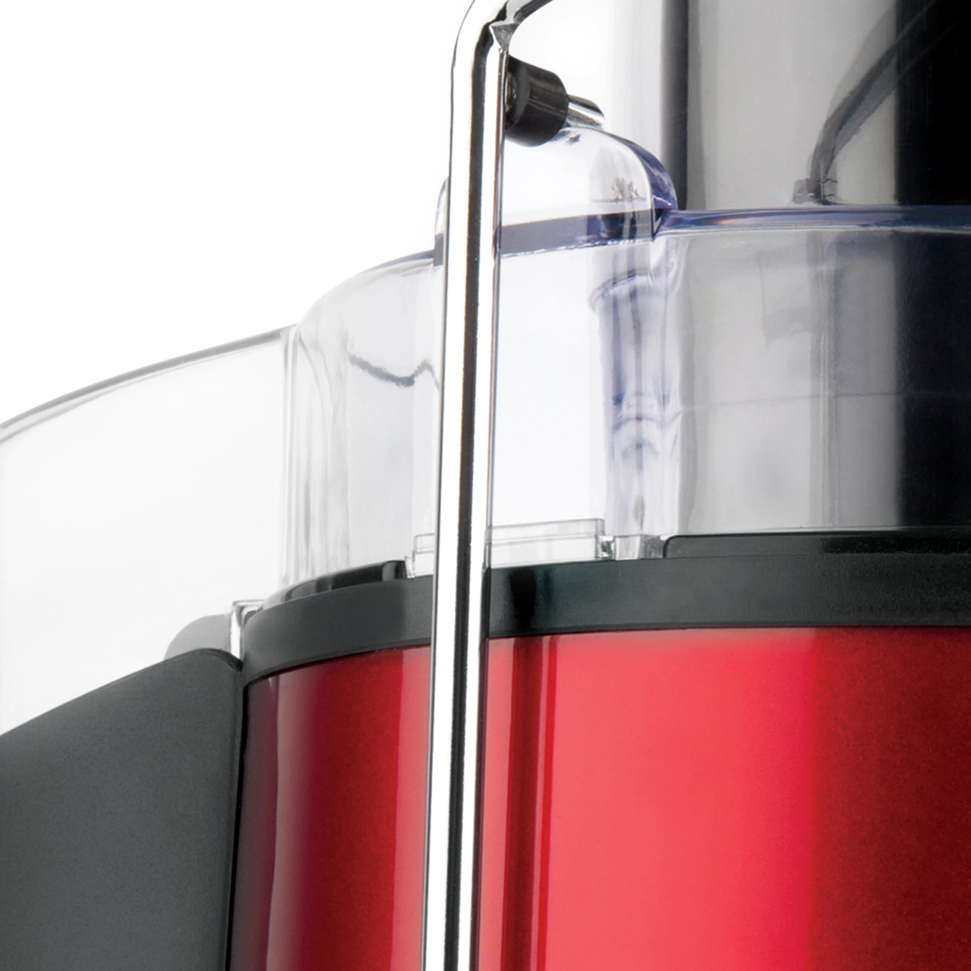 Red juicer with a clear container and chrome handle.