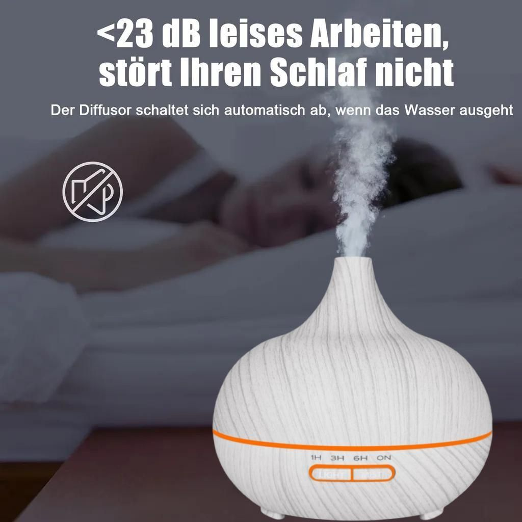 Ein Diffusor mit Dampf, daneben eine schlafende Person.