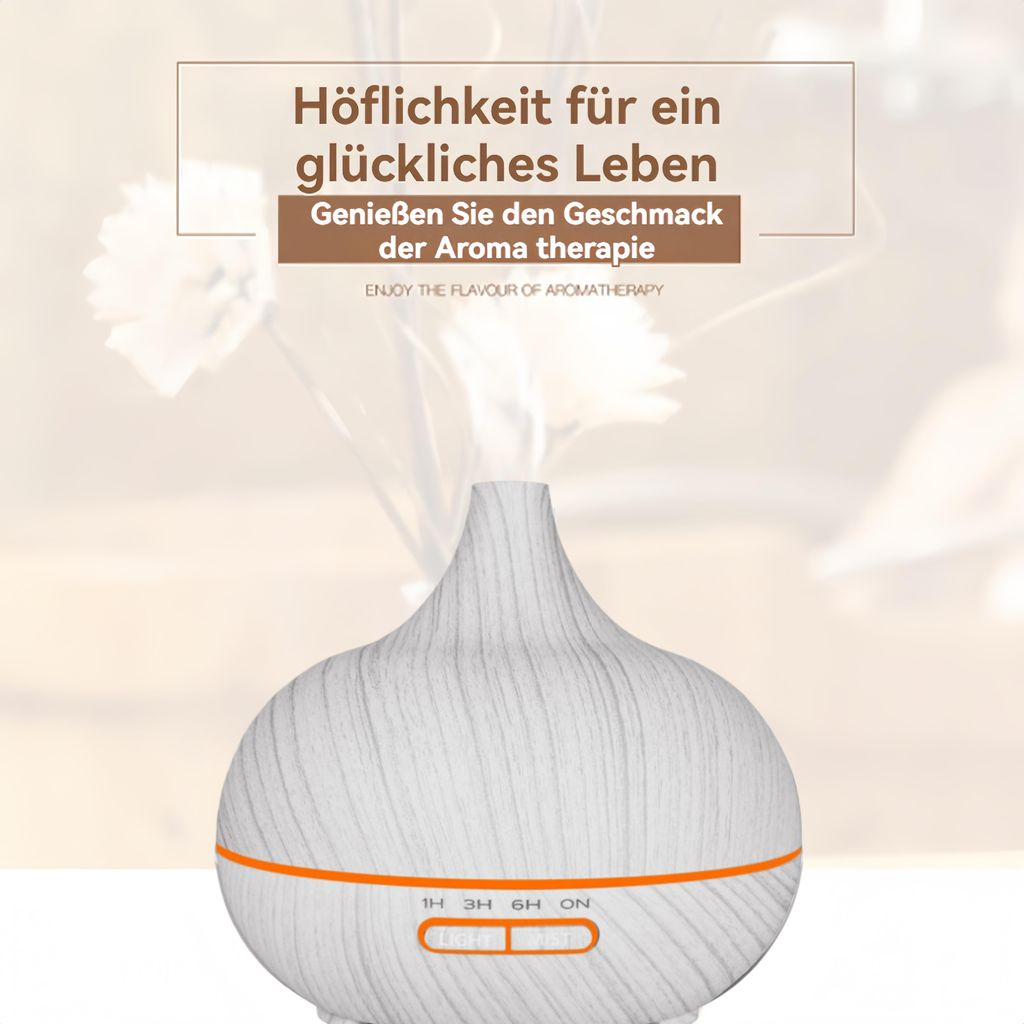 Ein weißer Diffusor mit Holzmaserung und orangefarbenen Bedienelementen.