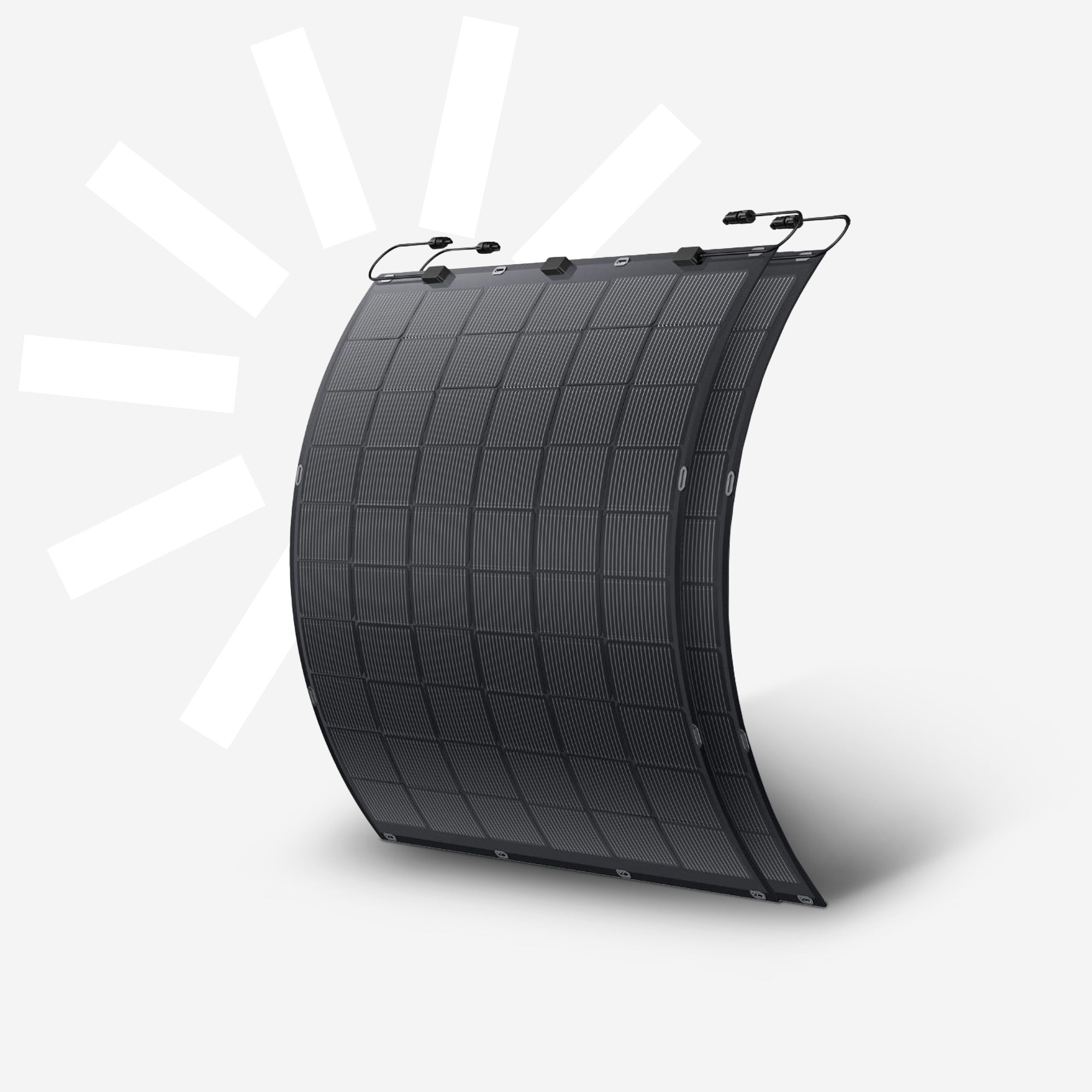 Ein flexibles, dunkles Solarpanel mit Anschlüssen, das sich krümmt.