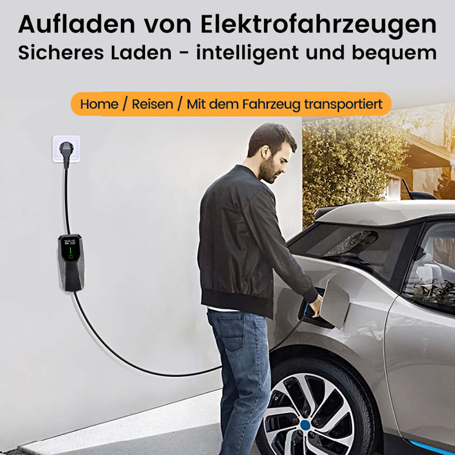 Mann lädt ein graues Elektroauto mit schwarzem Ladekabel auf.