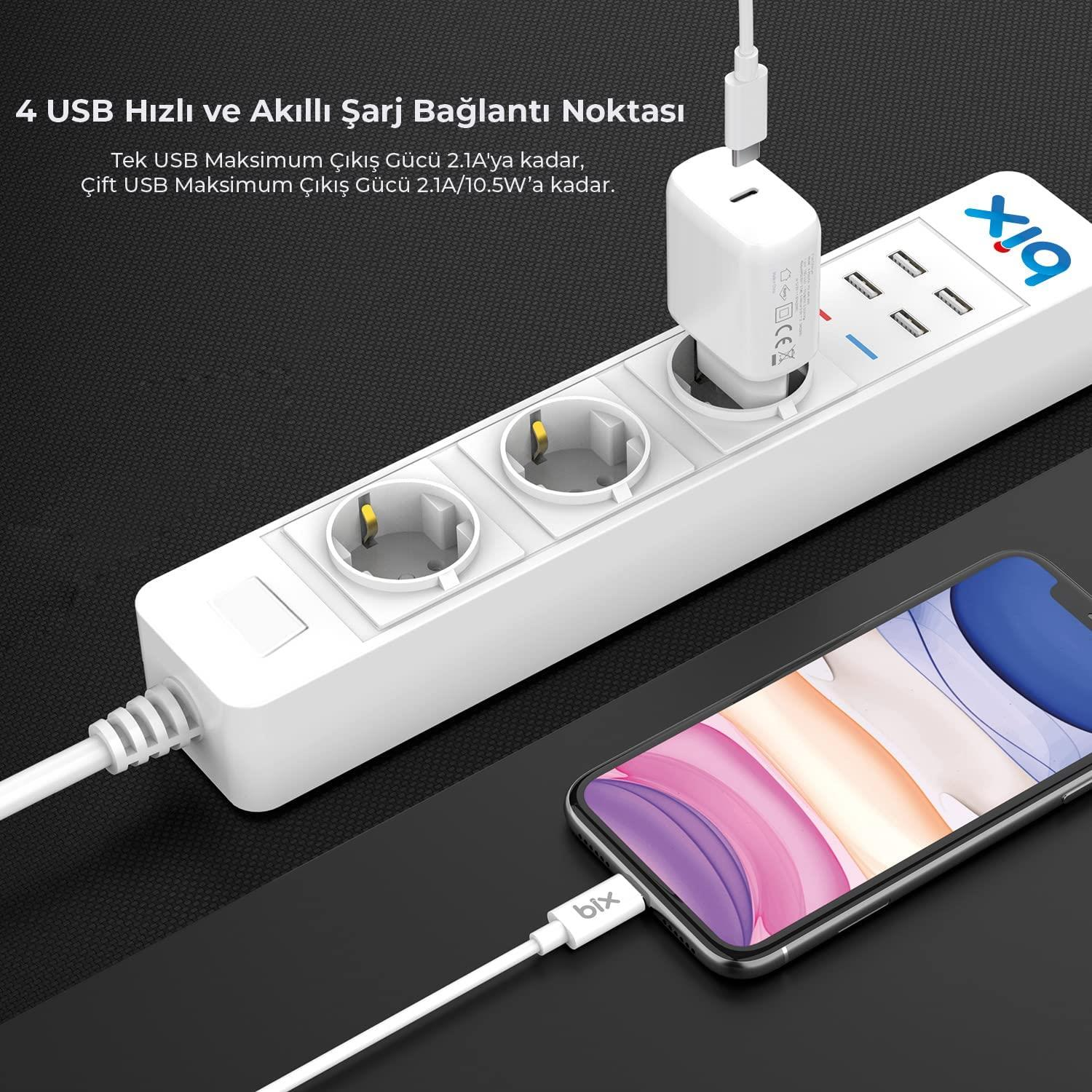 4 USB'li beyaz priz, akıllı telefon şarj ediyor.