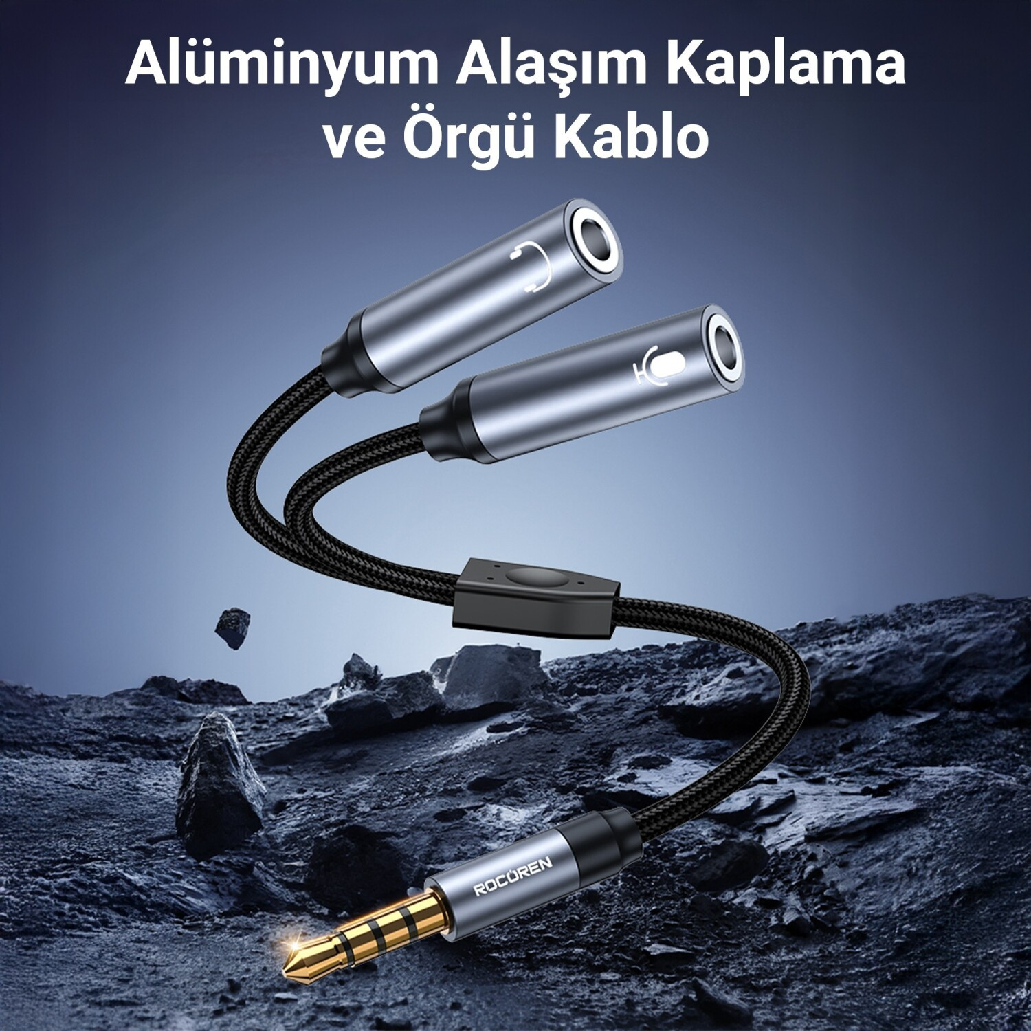 Sert zeminde, iki portlu ve örgülü kablolu gümüş alüminyum ayırıcı.