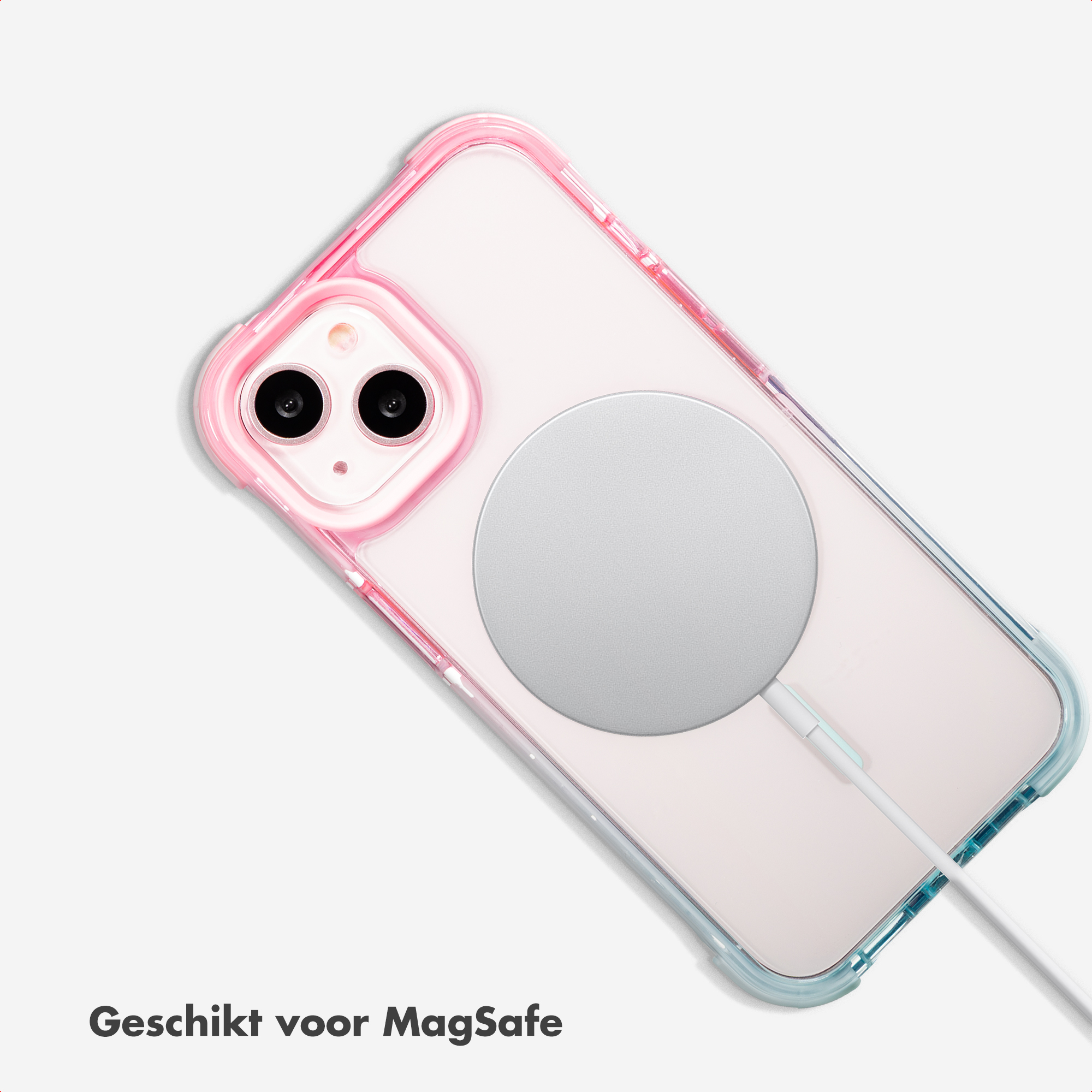Un iPhone avec chargeur MagSafe et une coque dégradée rose-bleu.