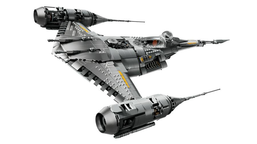 Szary model statku kosmicznego Lego z  żółtymi akcentami i dwoma silnikami.