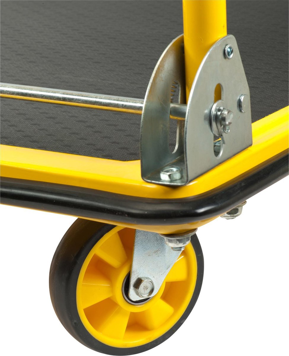 Close-up of a yellow hand truck wheel with a black tire and metal bracket.