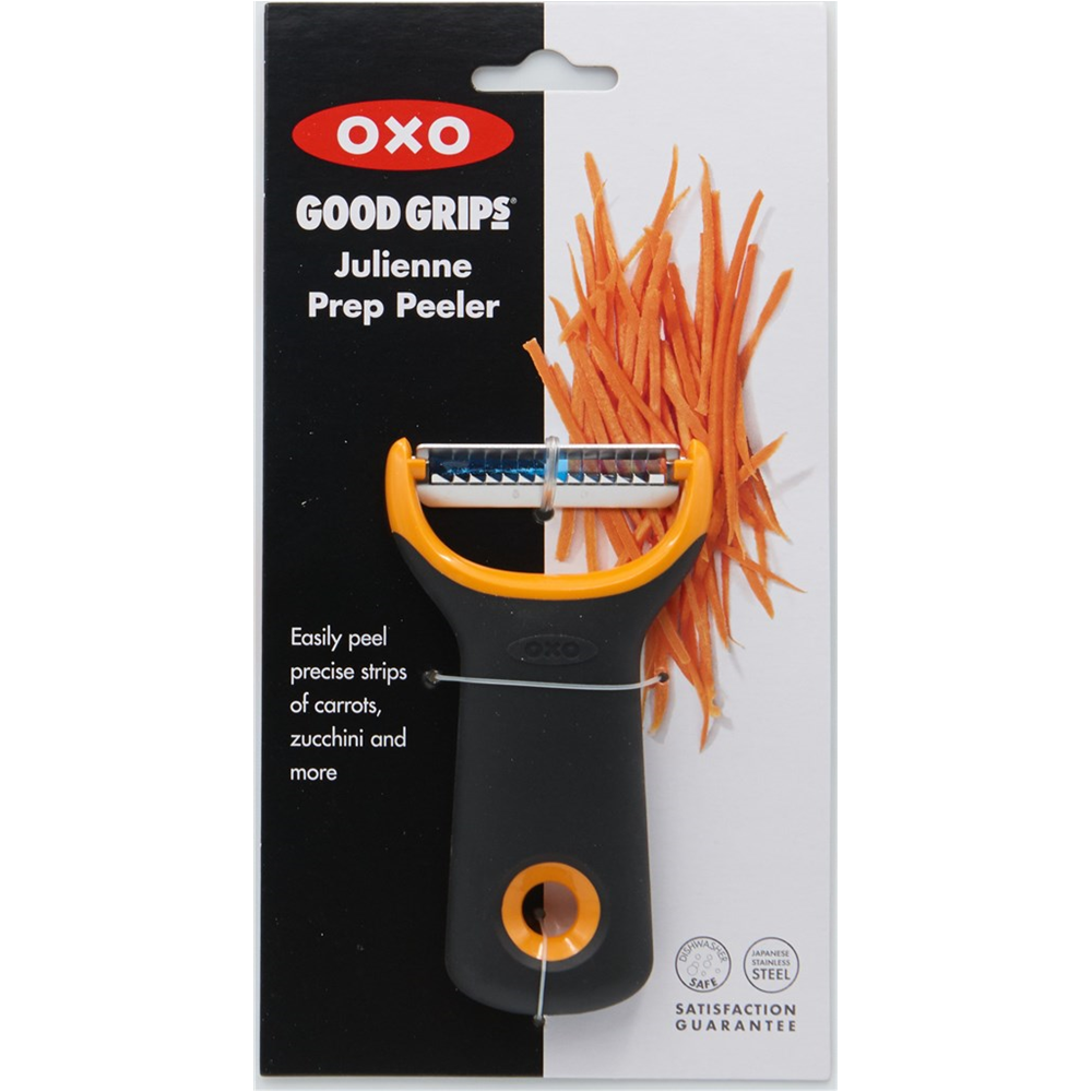 Pelapatate Julienne OXO Good Grips con manico arancione, impugnatura nera e carote julienne.