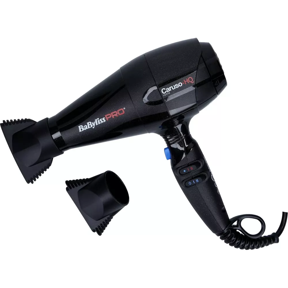 A black hairdryer with two attachments on a white background.