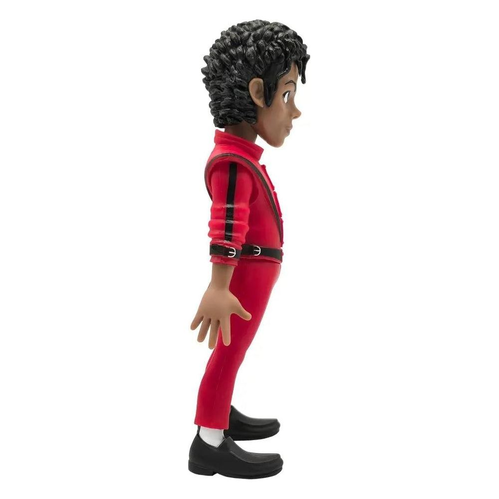 Eine Figur von Michael Jackson in einem roten Anzug mit schwarzen Streifen und Schuhen.