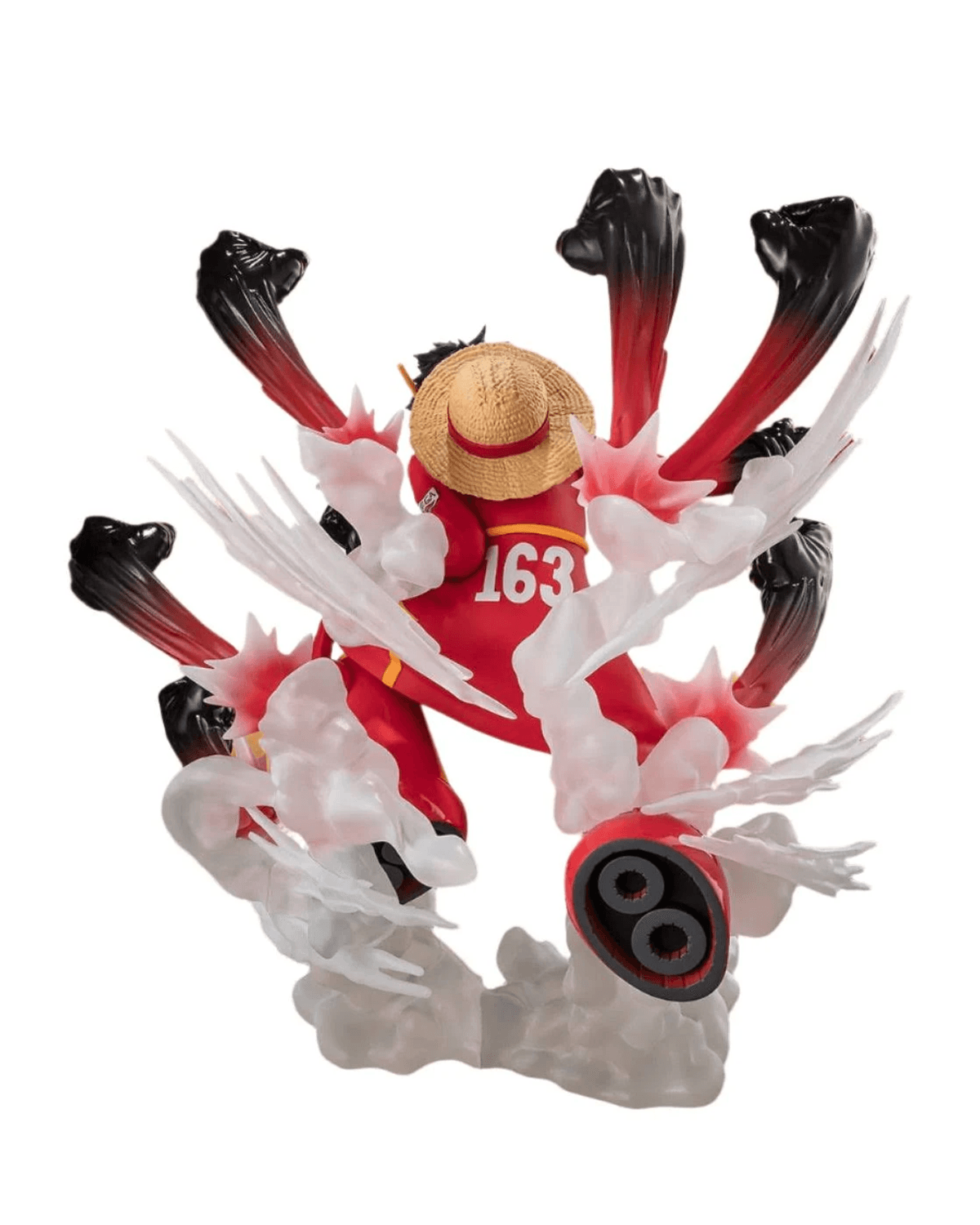 Figura roja con sombrero de paja, número 163, rodeada de explosiones de energía y humo blanco.