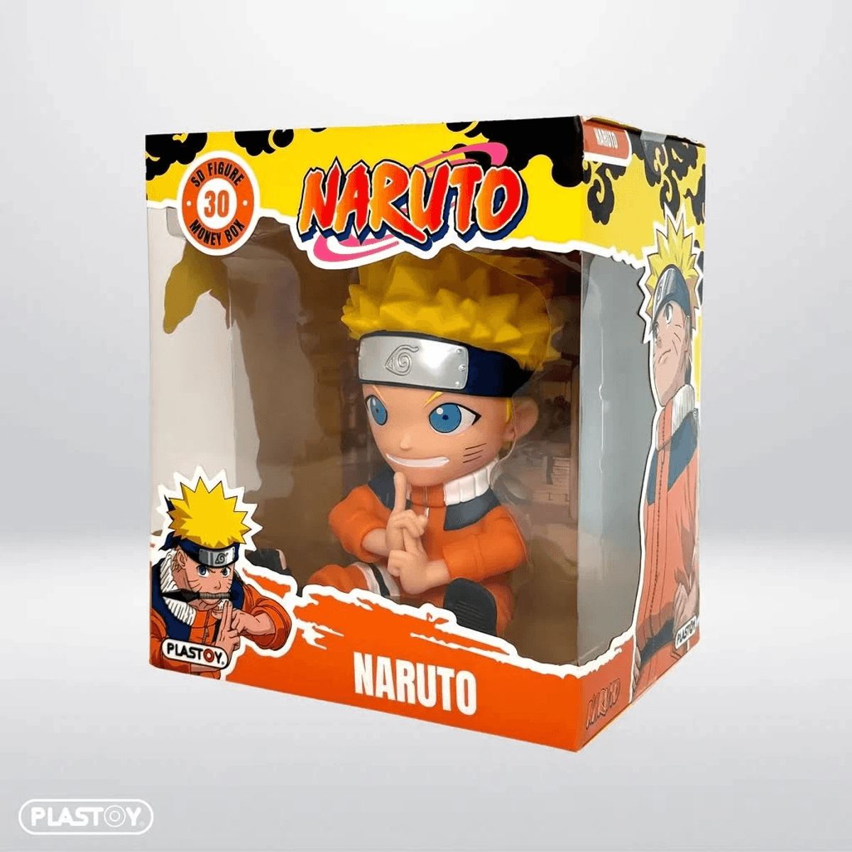 Figura de Naruto en caja, sentada, con pelo amarillo y traje naranja.