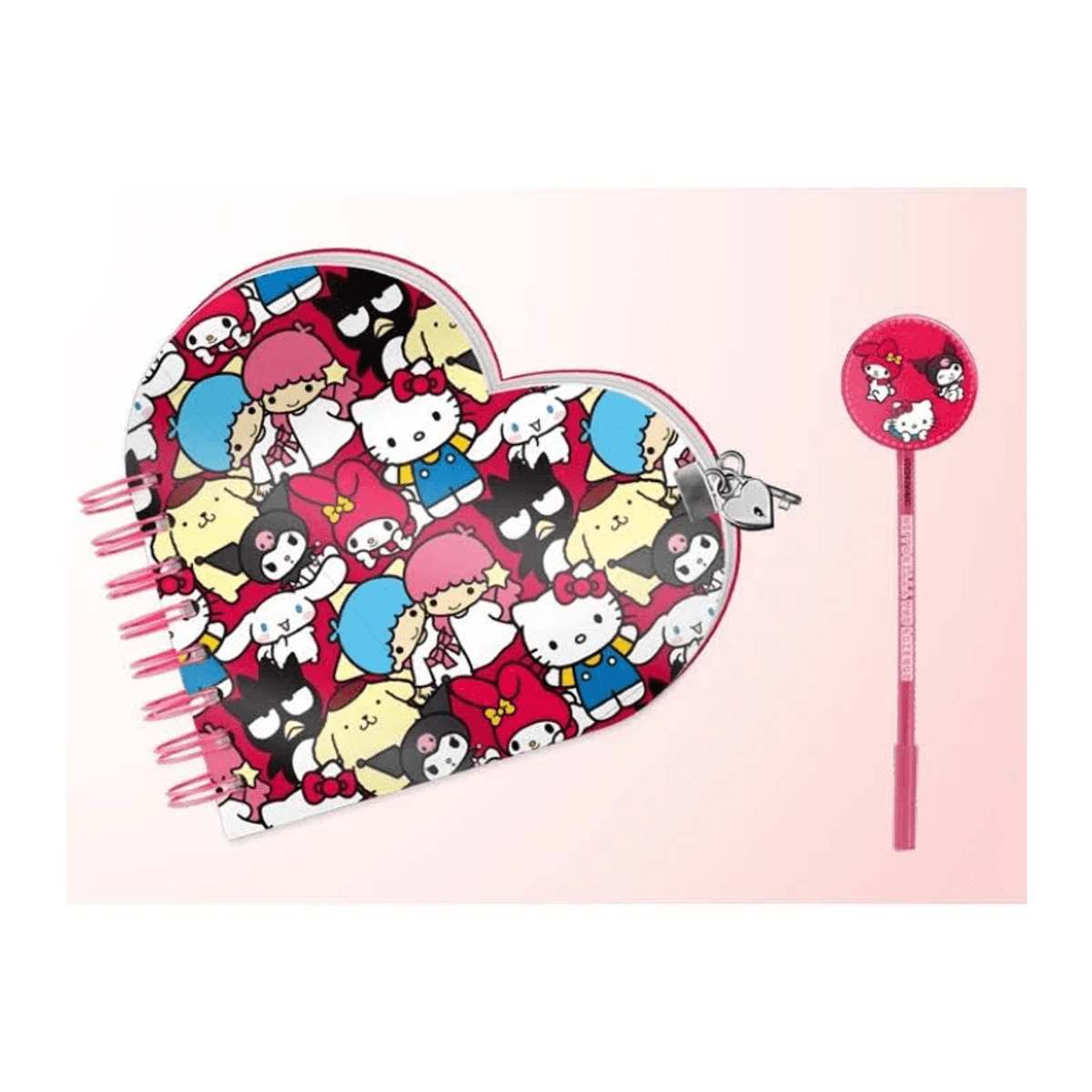 Un cuaderno en forma de corazón con personajes de Sanrio y un bolígrafo a juego sobre fondo rosa.