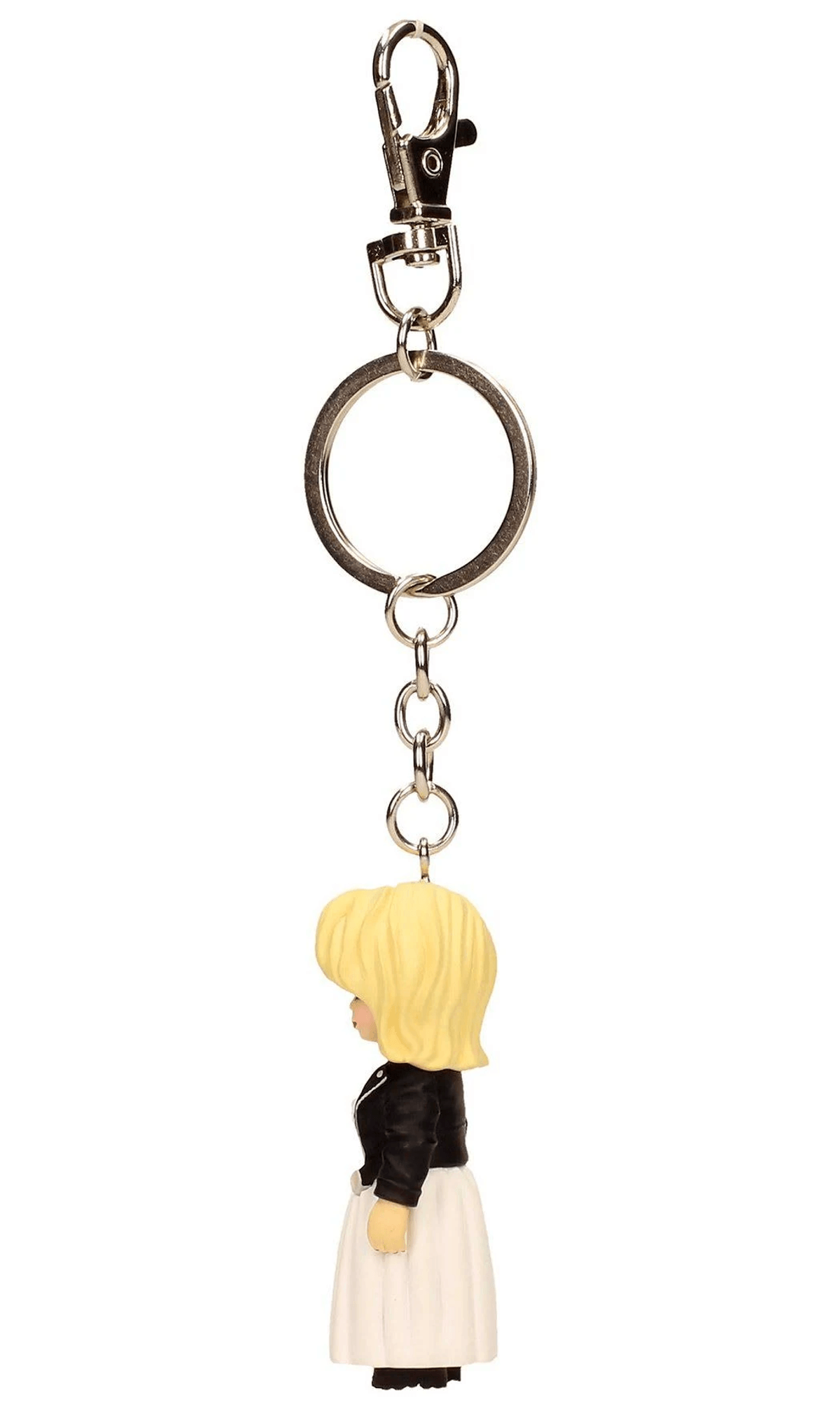 Llavero con charm de figura rubia en chaqueta negra y falda blanca.