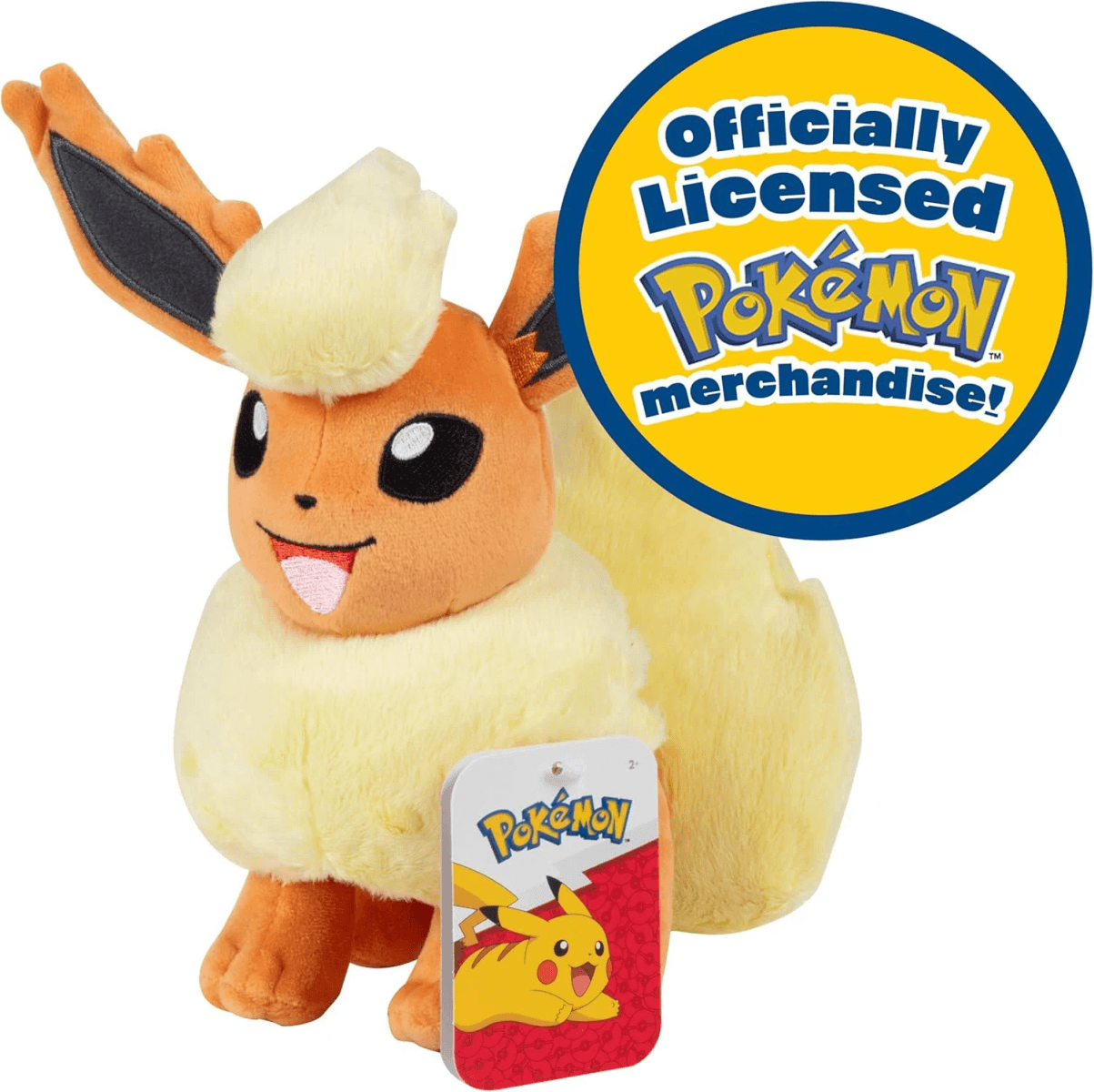Un personaje de peluche de Pokémon naranja y amarillo con pegatina de licencia oficial.