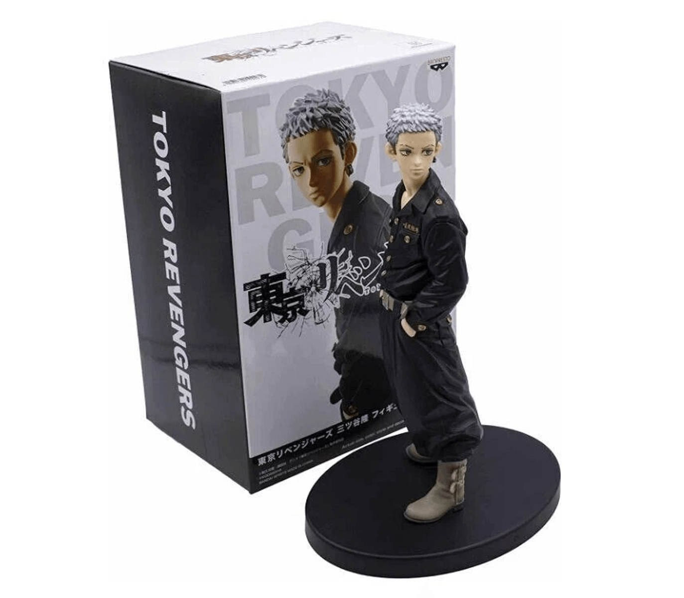 Una figura de anime con uniforme negro junto a una caja de 'Tokyo Revengers'.