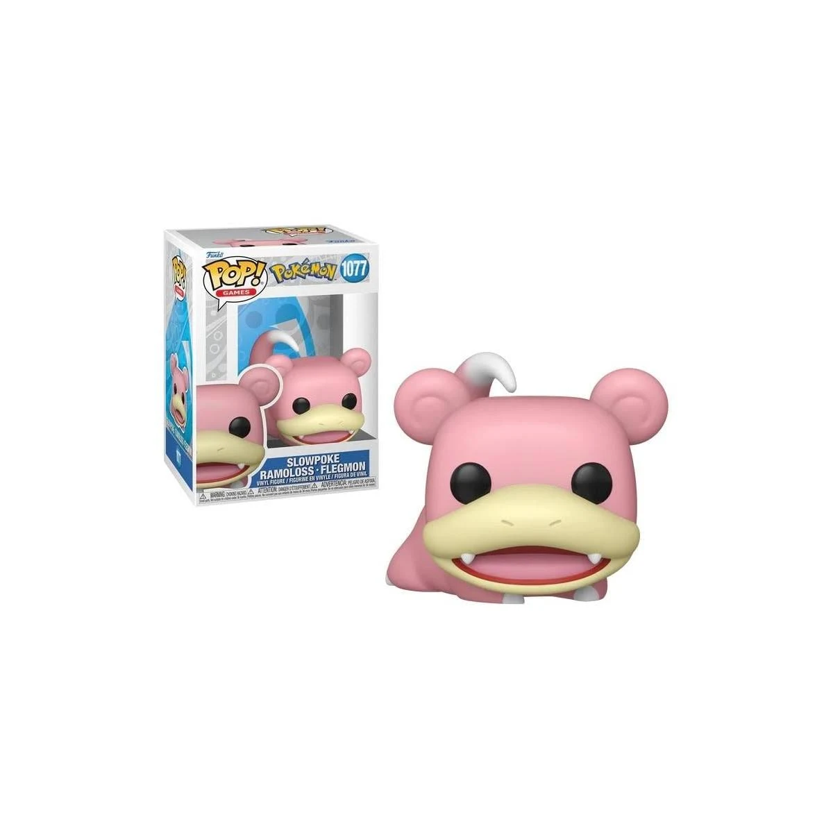 Una figura rosa de Slowpoke con la boca abierta y su caja cerca.