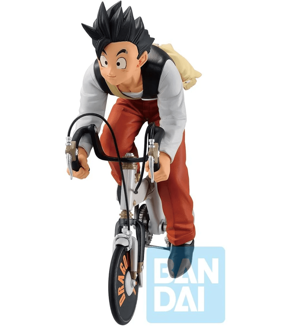 Una figura de Gohan en bicicleta, con pantalones naranjas y chaleco.