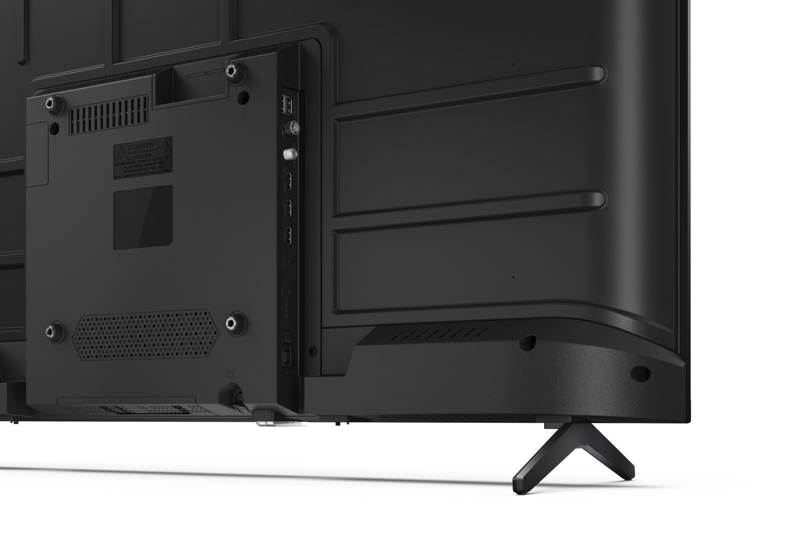 Retro di una TV nera con porte e supporto.