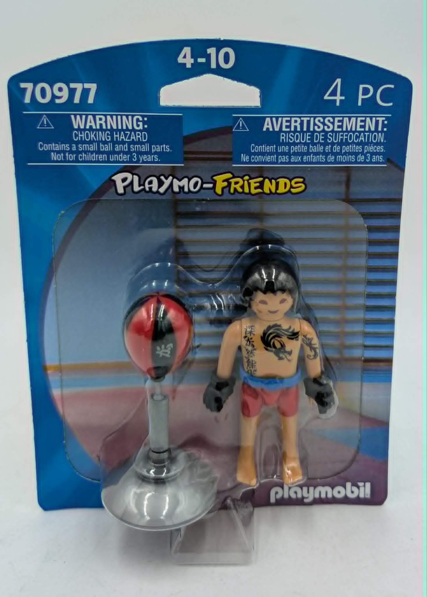 Figurka Playmobil wojownika z workiem treningowym w pudełku.