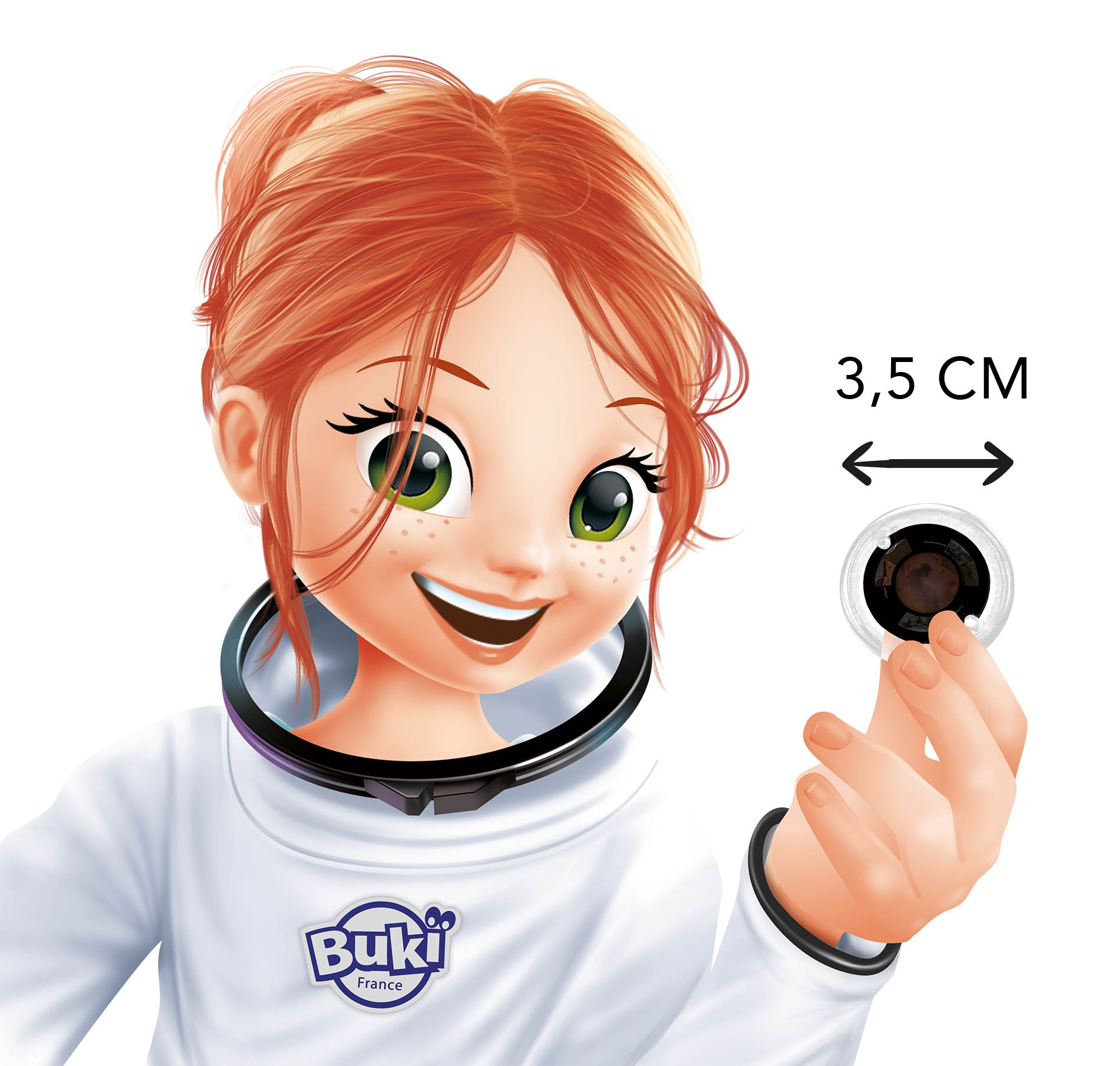 Ein Mädchen mit roten Haaren hält ein kleines rundes Objekt. Es ist 3,5 cm groß.