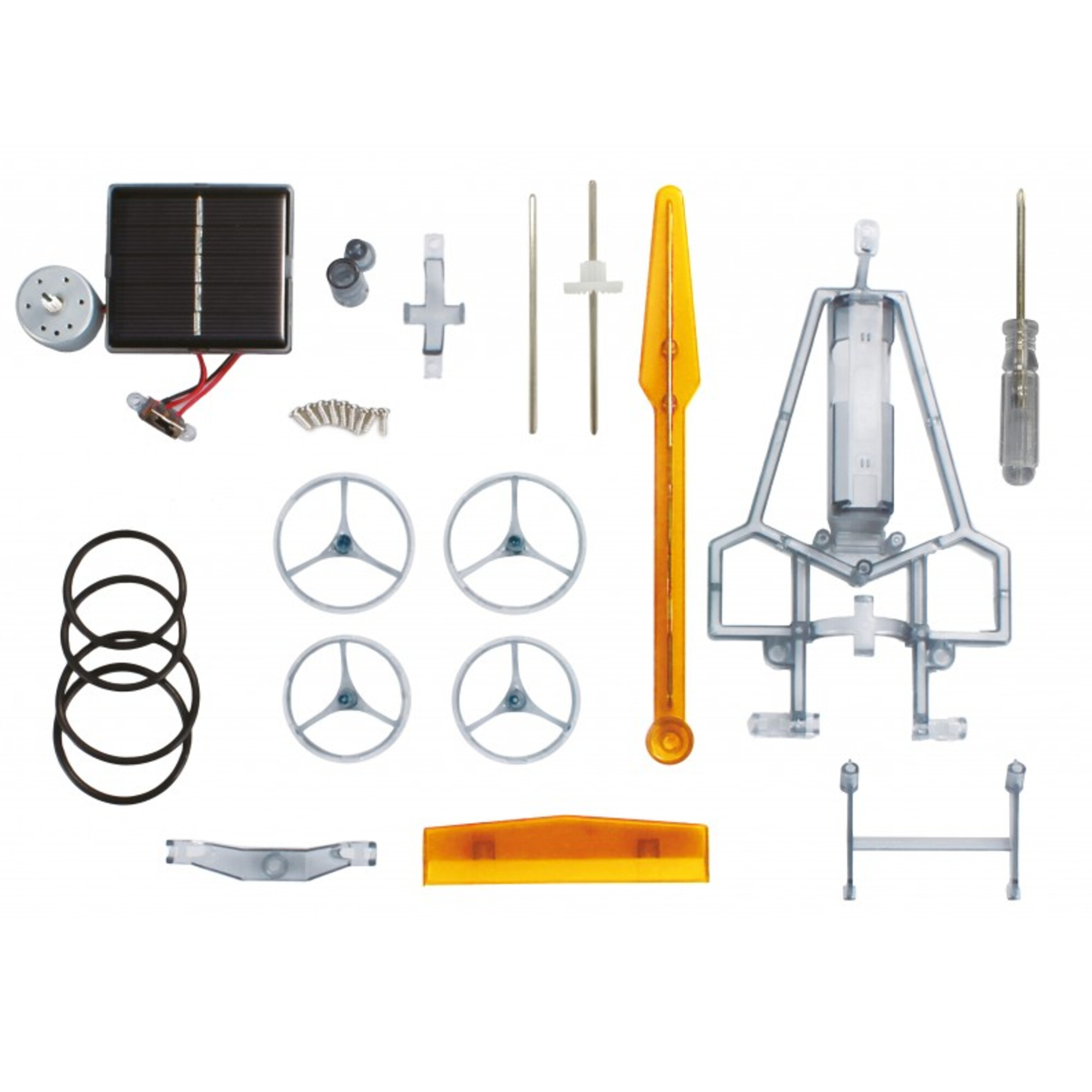 Solarpanel, Motor, Räder, Gummiringe, Werkzeug und Bauteile für ein Modell.