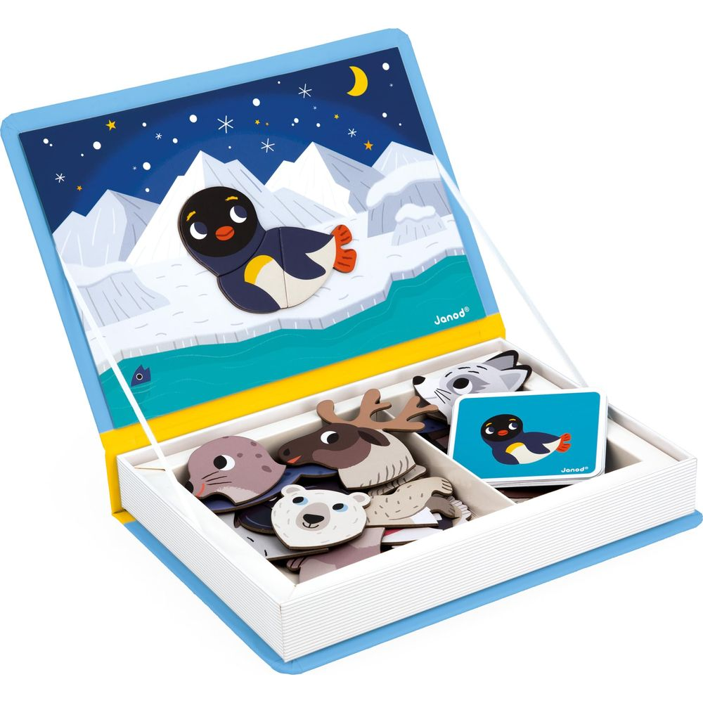 Spielzeug mit arktischen Tieren, Pinguin auf Eisberg, im Buch.
