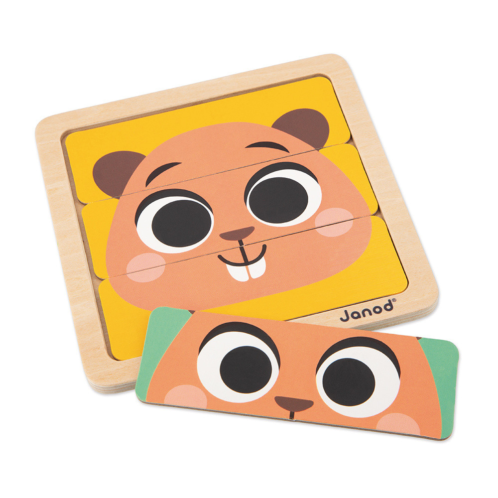 Puzzle en bois avec une tête d'ours sur fond jaune et une pièce séparée.