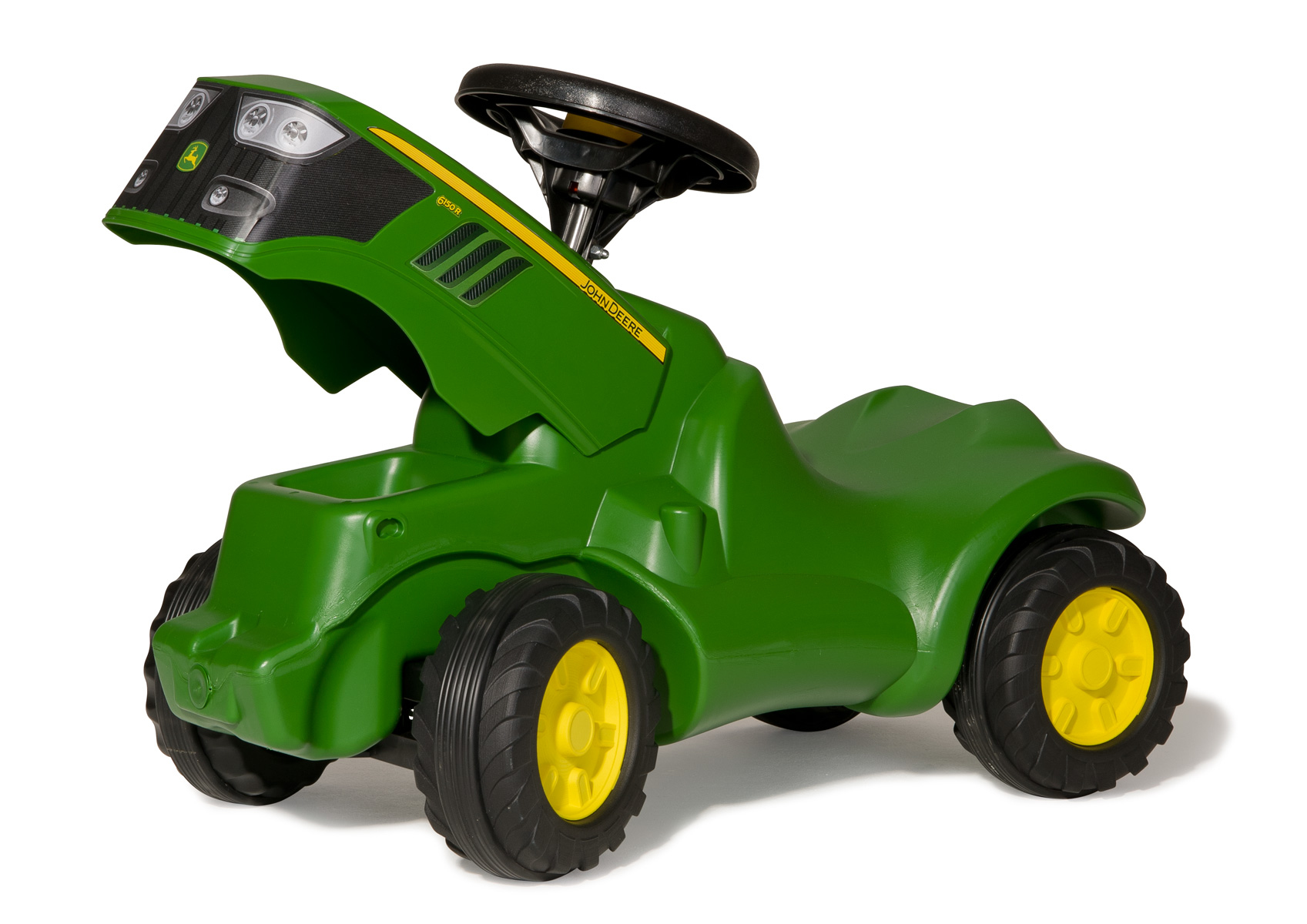 Grüner Spielzeugtraktor mit gelben Felgen und schwarzem Lenkrad.