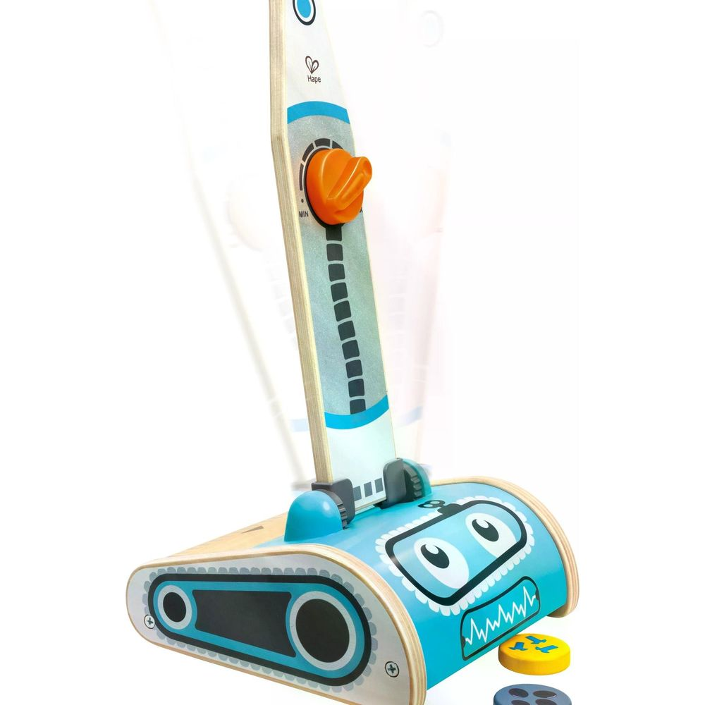 Una aspiradora de juguete azul con cara de robot sonriente y dial naranja.