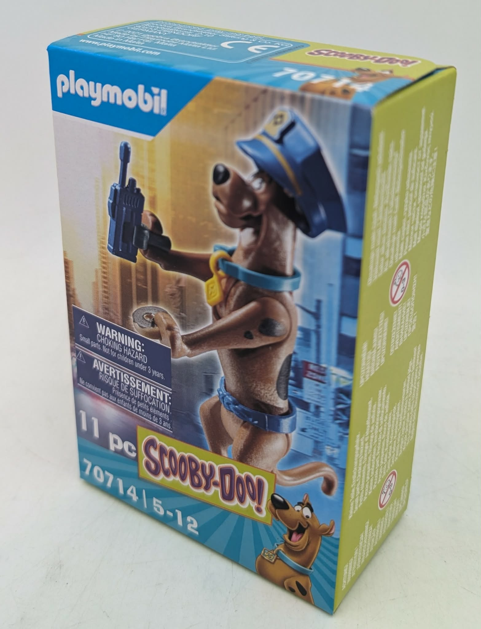 Playmobil Scooby-Doo Verpackung mit Figur, die eine Polizeikappe und eine Pistole trägt.