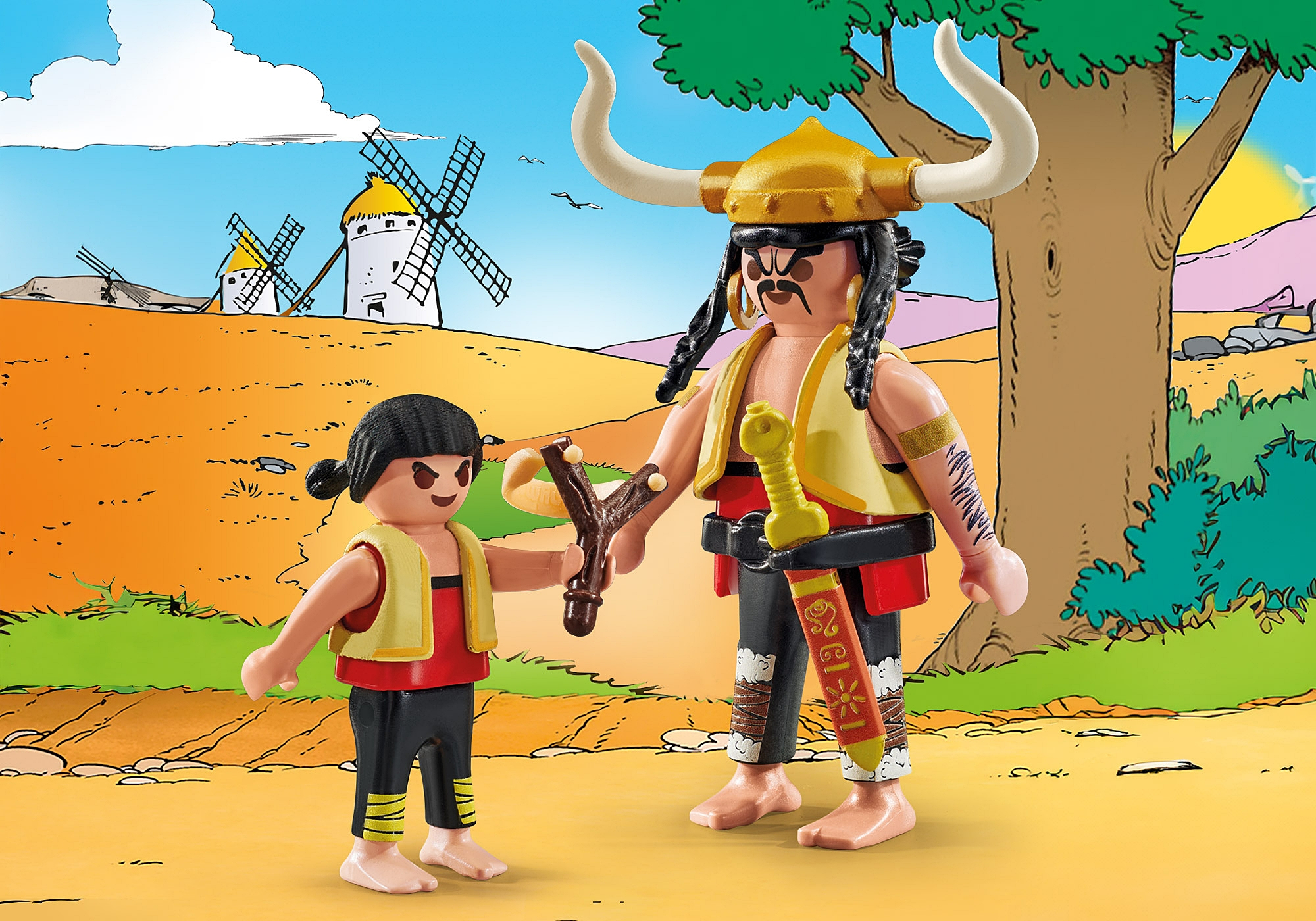 Dwie figurki Playmobil na tle krajobrazu z wiatrakami.