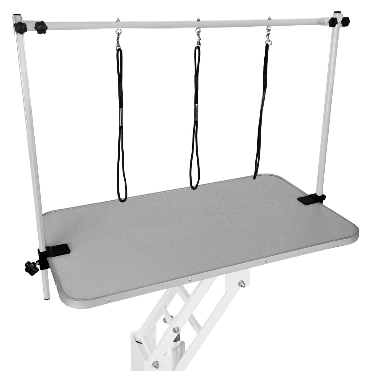 Una mesa de aseo ajustable blanca con tapa gris y tres lazos.