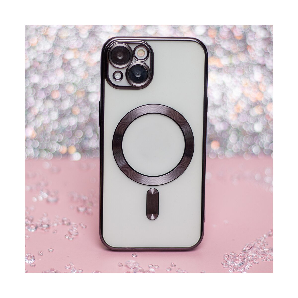 Ein hellgraues Handycover mit MagSafe-Ring auf rosa Untergrund.