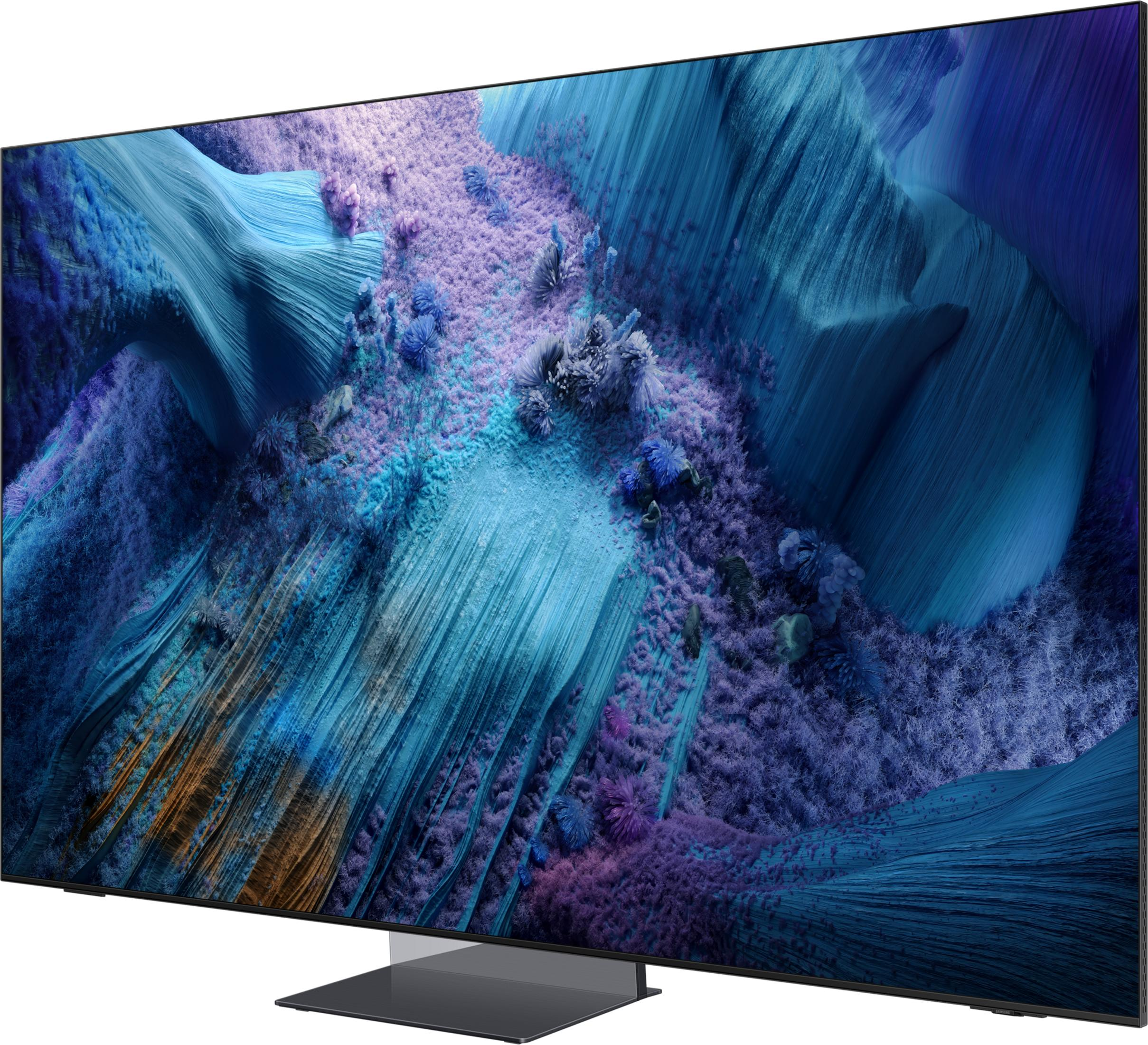 Un televisore moderno che visualizza contenuti astratti sullo schermo blu e viola.