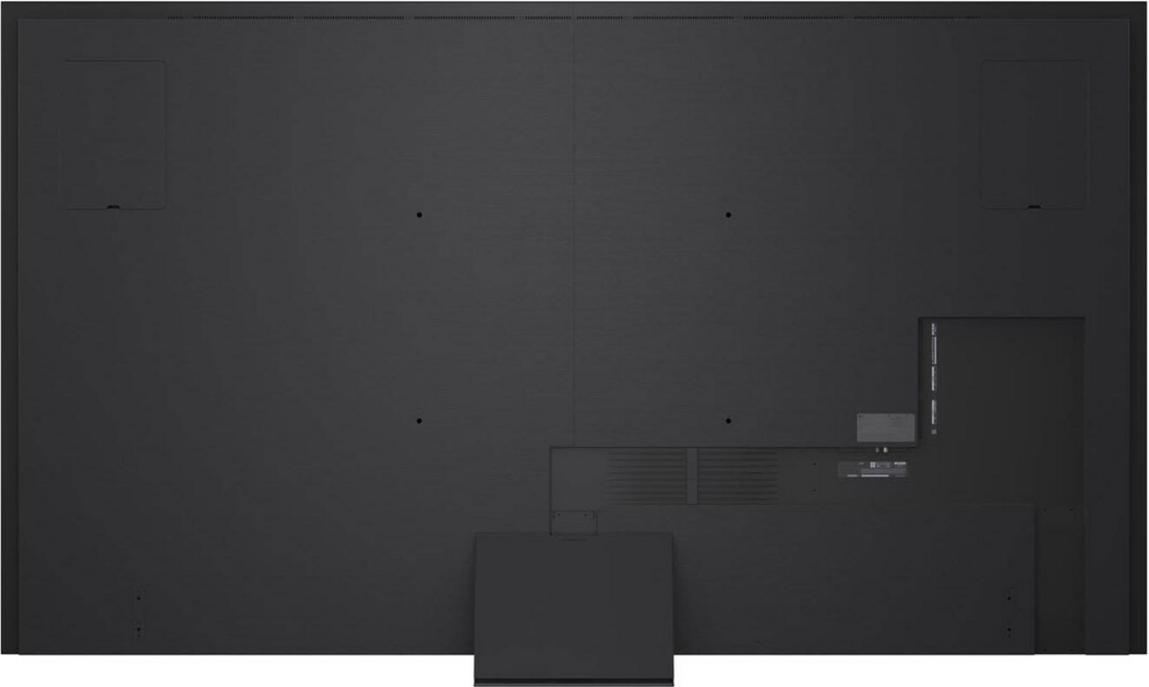 Arrière d'un grand écran noir avec ports et grilles de ventilation.