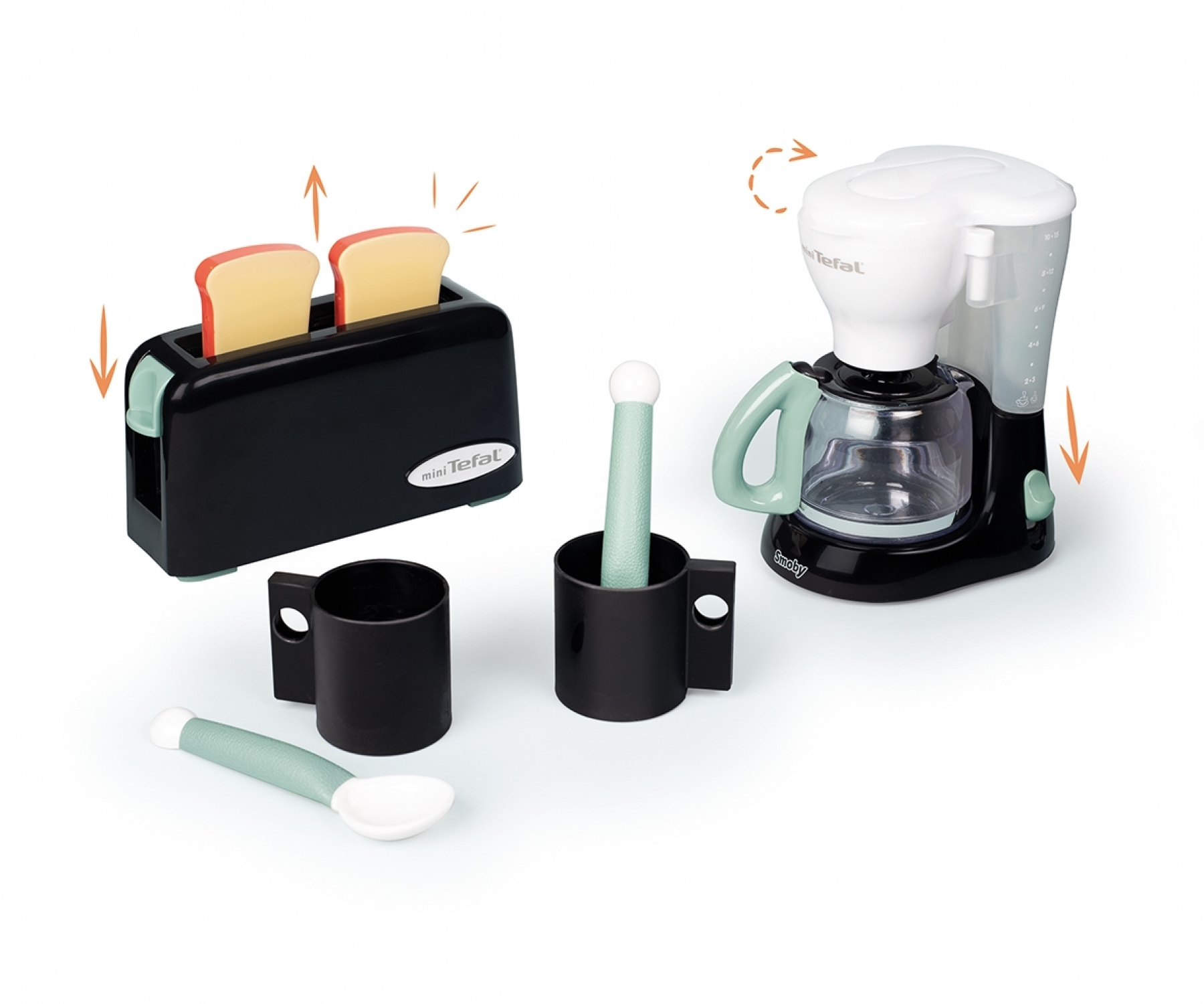 Ein Spielzeug-Toaster mit zwei Brotscheiben, eine Kaffeemaschine, zwei Tassen und ein Löffel.