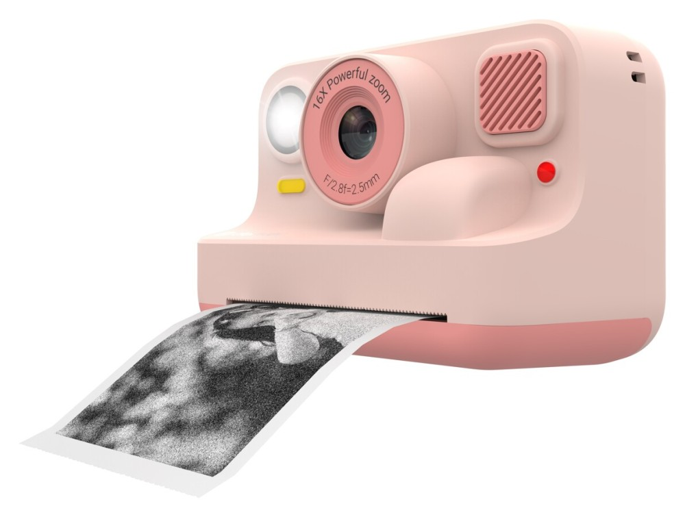A pink instant camera prints a grainy black and white photo.
