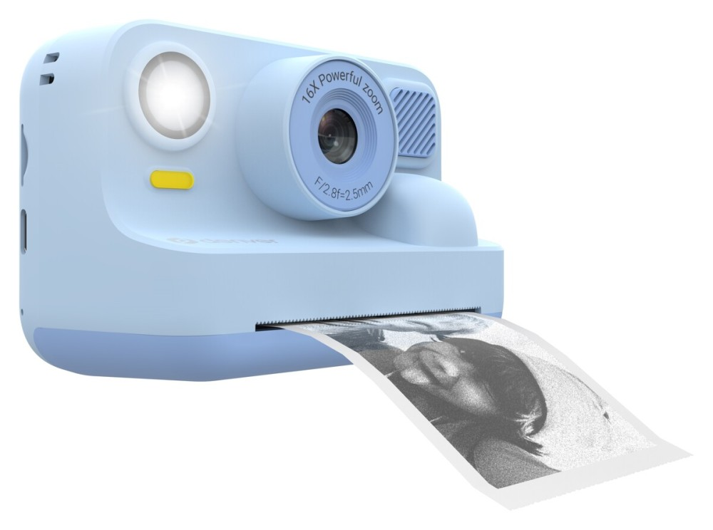 A light blue instant camera is printing a black and white photo.