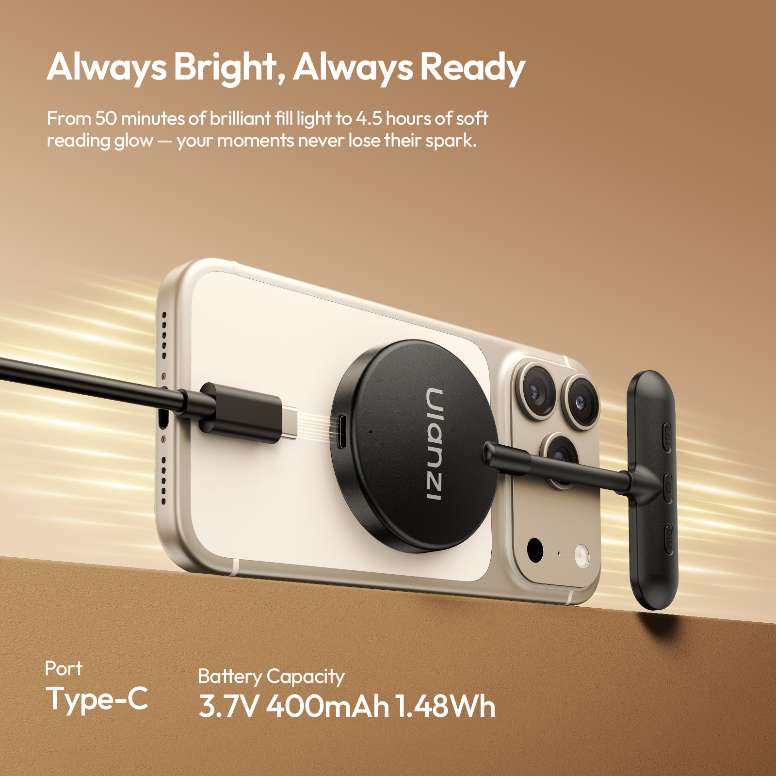 A smartphone with an external battery and charging cable on a brown surface.